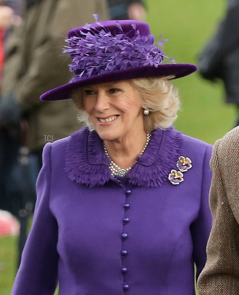 Prince Charles, Prince of Wales and Camilla, Duchess of Cornwall (L) attend the traditional Christmas Day church service at St Mary Magdalene Church, Sandringham on December 25, 2012 near King's Lynn, England