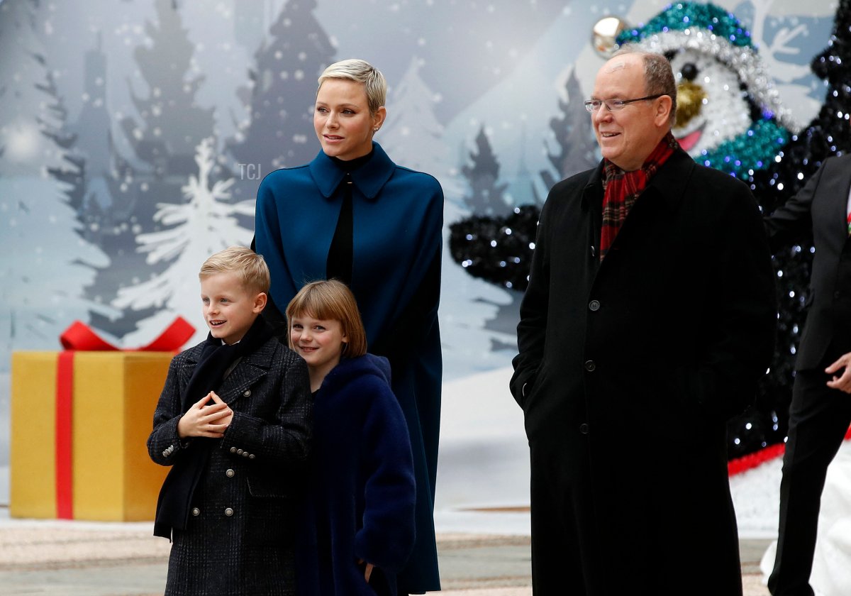 Prince Albert II of Monaco (R), Princess Charlene of Monaco (C), Prince Jacques (L) and Princess Gabriella (2ndL) attend the inauguration of the traditional Christmas tree ceremony at the Monaco Palace, in Monaco, on December 14, 2022