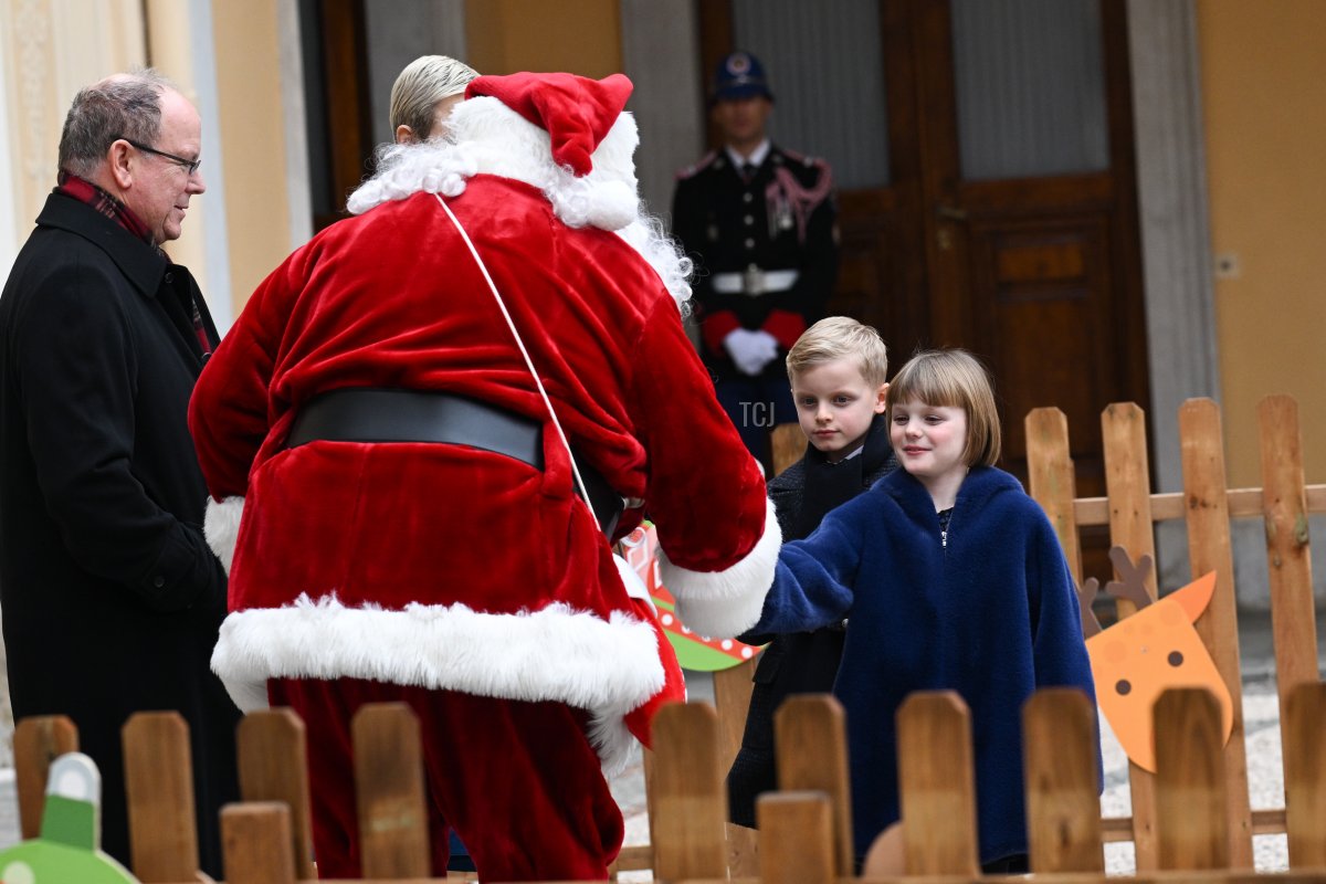 Prince Albert II of Monaco, Prince Jacques of Monaco and Princess Gabriella of Monaco attend the Christmas Tree at Monaco Palace on December 14, 2022 in Monaco