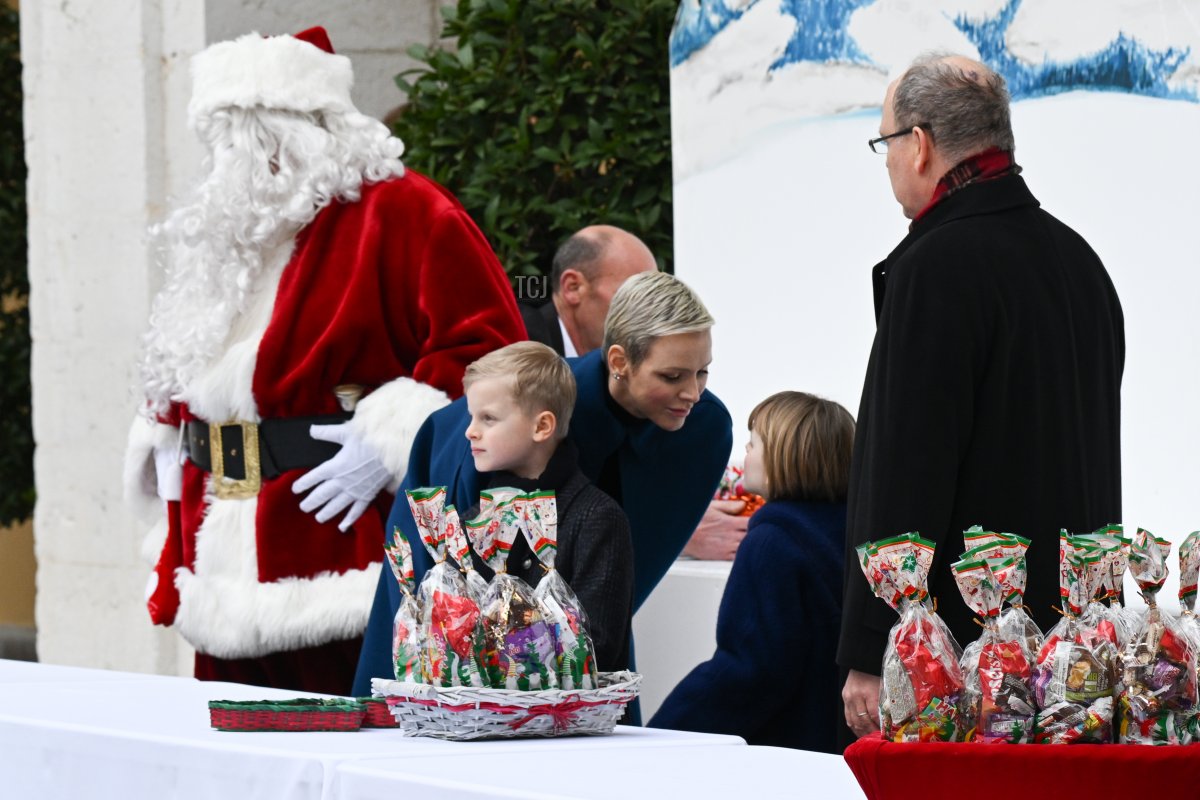 Princess Charlene of Monaco, Prince Jacques of Monaco, Princess Gabriella of Monaco and Prince Albert II of Monaco attend the Christmas Tree at Monaco Palace on December 14, 2022 in Monaco