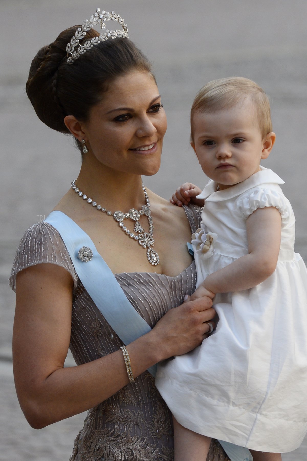 Sweden's Crown Princess Victoria arrives with Princess Estelle on June 8, 2013, at the Royal Chapel for Princess Madeleine of Sweden and Christopher O'Neill's wedding ceremony in Stockholm (JONATHAN NACKSTRAND/AFP via Getty Images)