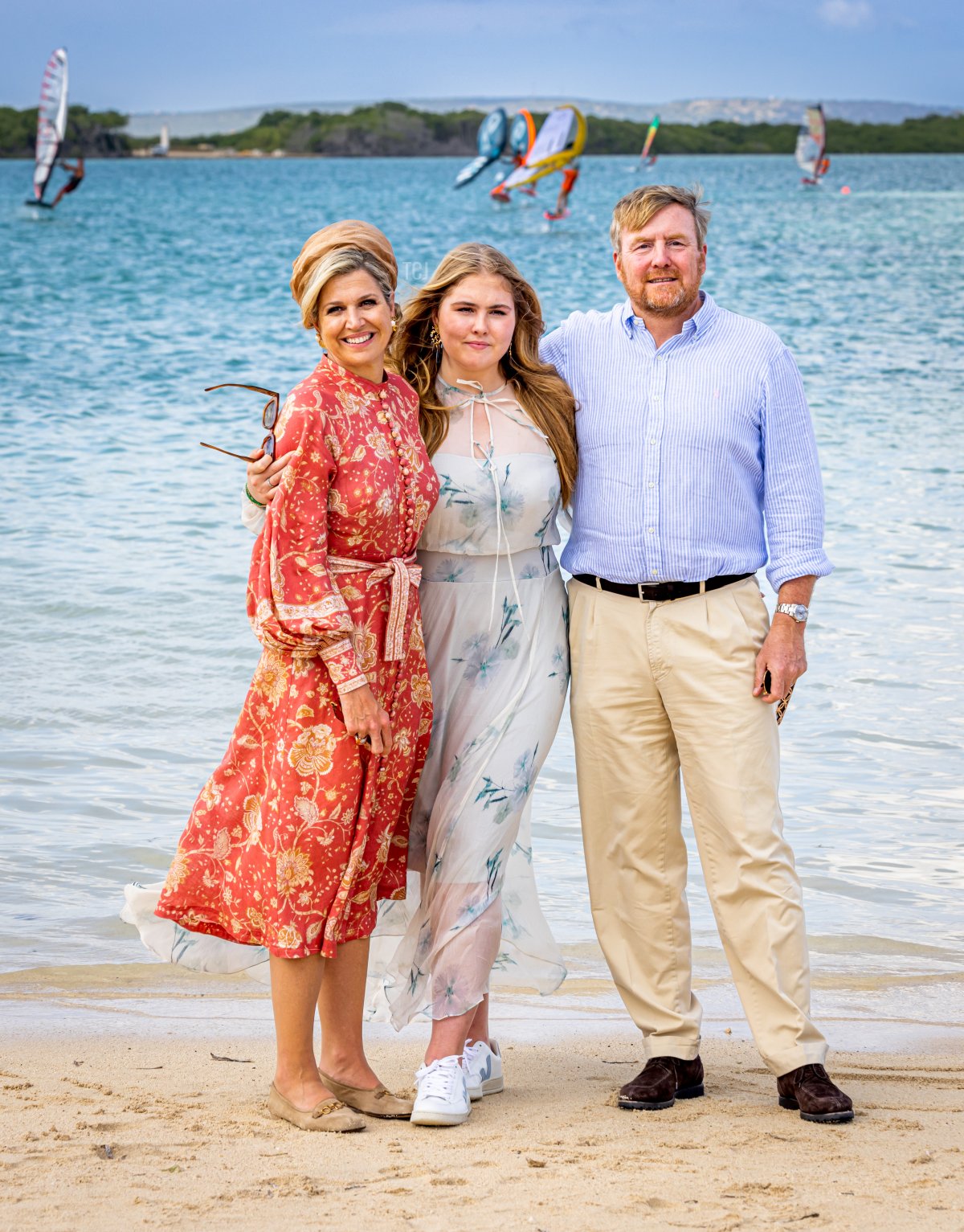 King Willem-Alexander of the Netherlands, Queen Maxima of the Netherlands and Princess Amalia of the Netherlands visit a windsurfing demonstration at Sorbonne Beach on day two of the Dutch royal family's tour of the Dutch Caribbean Islands on January 28, 2023 in Kralendijk, Bonaire (Patrick van Katwijk/Getty Images)