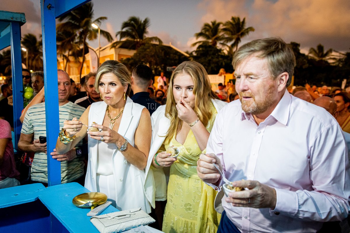 Queen Maxima of the Netherlands, Princess Amalia of the Netherlands and King Willem-Alexander of the Netherlands visit the Taste of Bonaire festival on day two of the Dutch royal family's tour of the Dutch Caribbean Islands on January 28, 2023 in Kralendijk, Bonaire (Patrick van Katwijk/Getty Images)