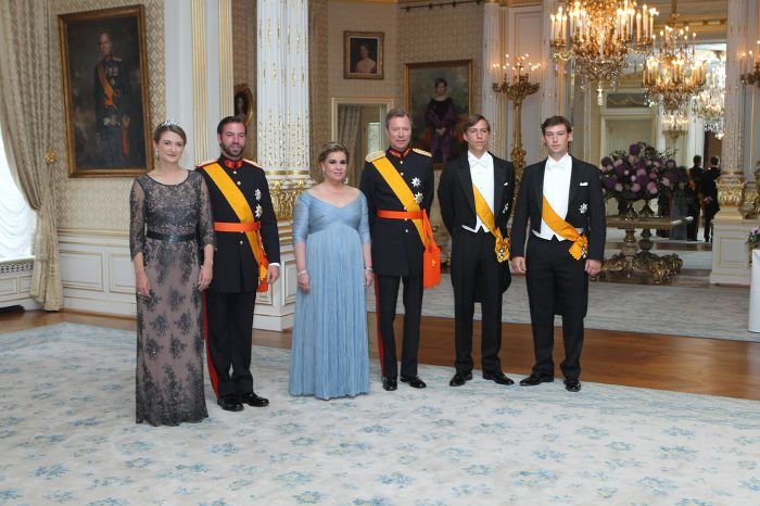 Grand Duke Henri, Grand Duchess Maria Teresa, Hereditary Grand Duke Guillaume, Hereditary Grand Duchess Stephanie, Prince Louis, and Prince Sebastien attend a gala celebrating Luxembourg's National Day on June 23, 2014 (Cour Grand-Ducale)