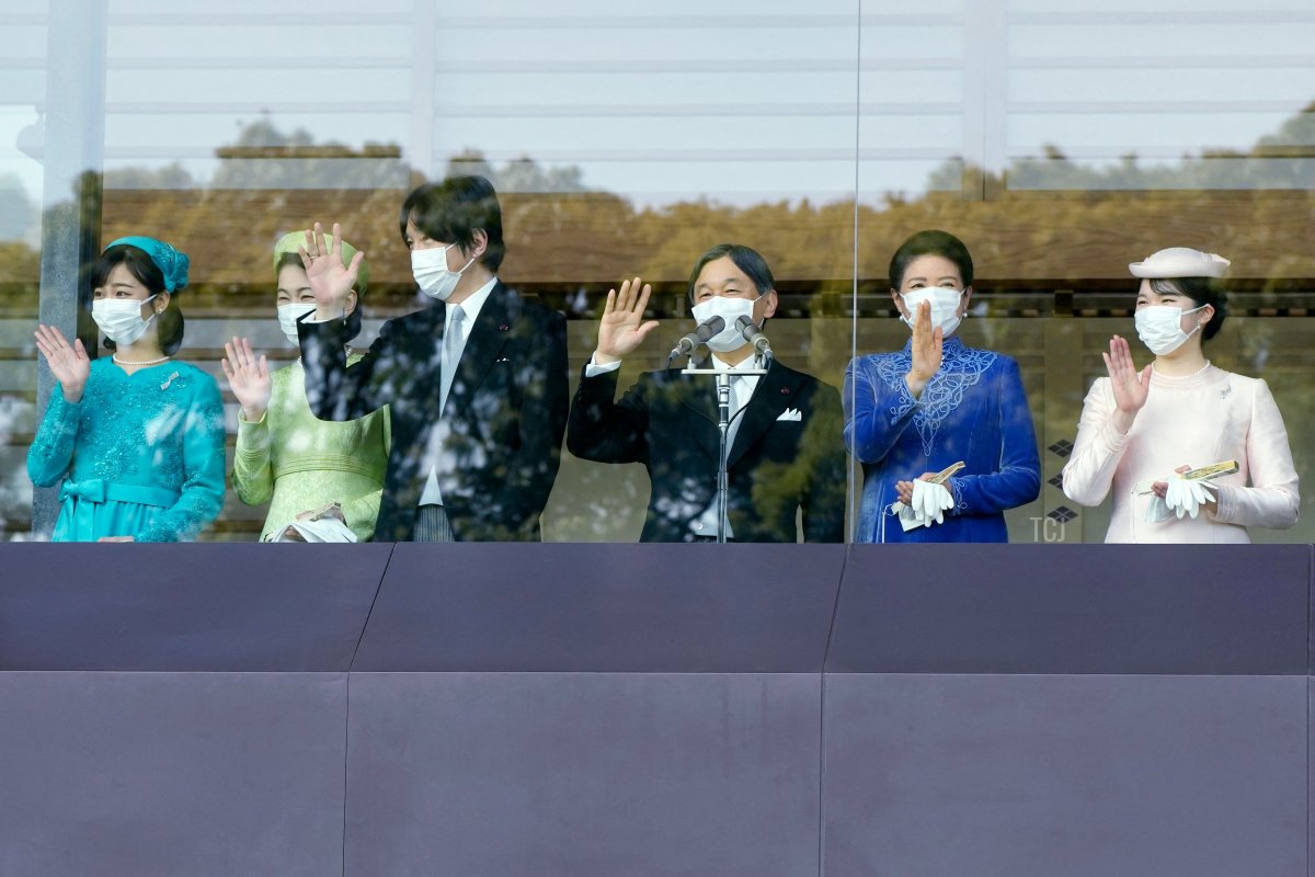 Members of Japan's imperial family greet people during Emperor Naruhito's birthday celebrations at the Imperial Palace on February 23, 2022 (EUGENE HOSHIKO/POOL/AFP via Getty Images)