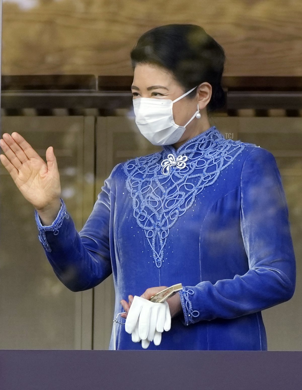Empress Masako of Japan greets people during Emperor Naruhito's birthday celebrations at the Imperial Palace on February 23, 2022 (EUGENE HOSHIKO/POOL/AFP via Getty Images)