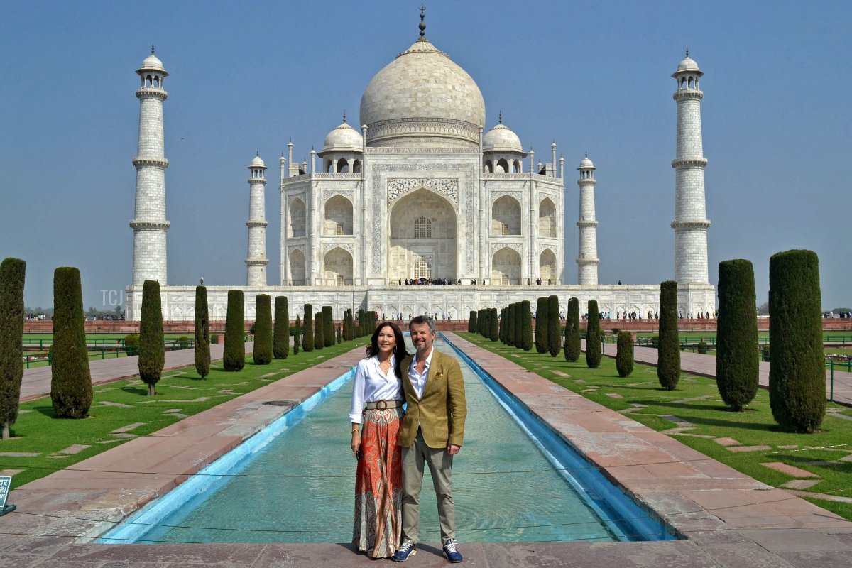 Denmark's Crown Prince Frederik and Crown Princess Mary pose for pictures in front of the Taj Mahal in Agra on February 26, 2023 (AFP via Getty Images)