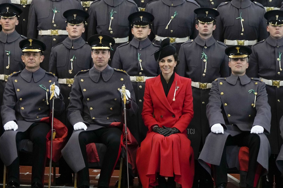 The Prince and Princess of Wales sit for an official photo with The Prince of Wales's company during a visit to the 1st Battalion Welsh Guards at Combermere Barracks for the St David’s Day Parade on March 1, 2023 in Windsor, England (Alastair Grant - WPA Pool/Getty Images)