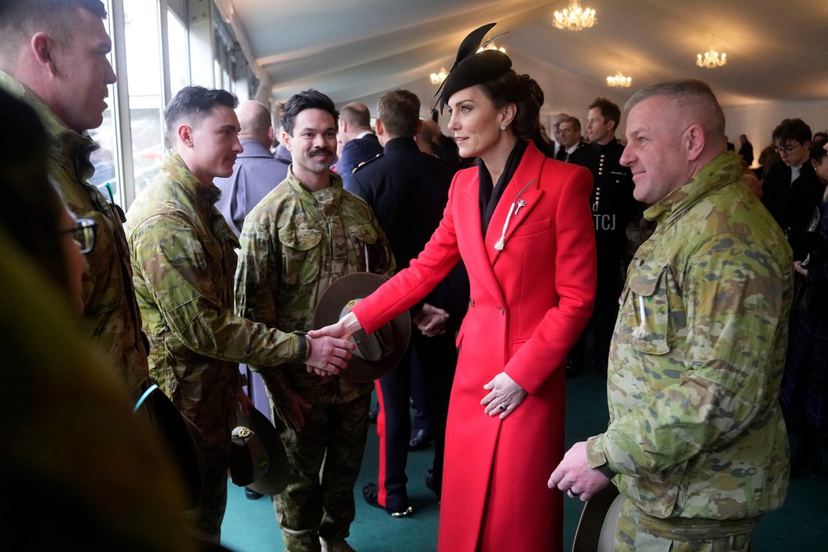 The Princess of Wales meets troops from the 5th Battalion of the Royal Australian regiment after a St David's Day Parade with 1st Battalion Welsh Guards at the Combermere Barracks in Windsor, west of London, on March 1, 2023 (ALASTAIR GRANT/POOL/AFP via Getty Images)