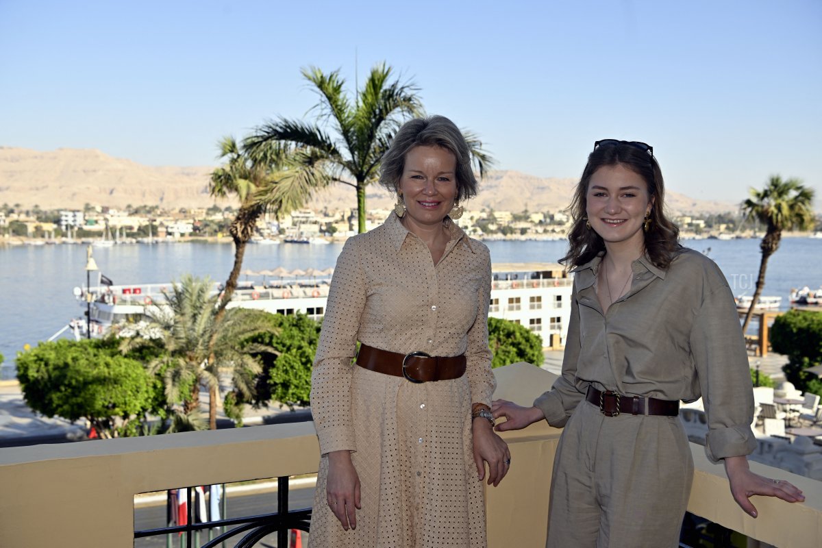 The Queen of the Belgians and the Duchess of Brabant pose for the photographer during a visit to the Winter Palace in Luxor, Egypt, March 15, 2023 (ERIC LALMAND/BELGA MAG/AFP via Getty Images)