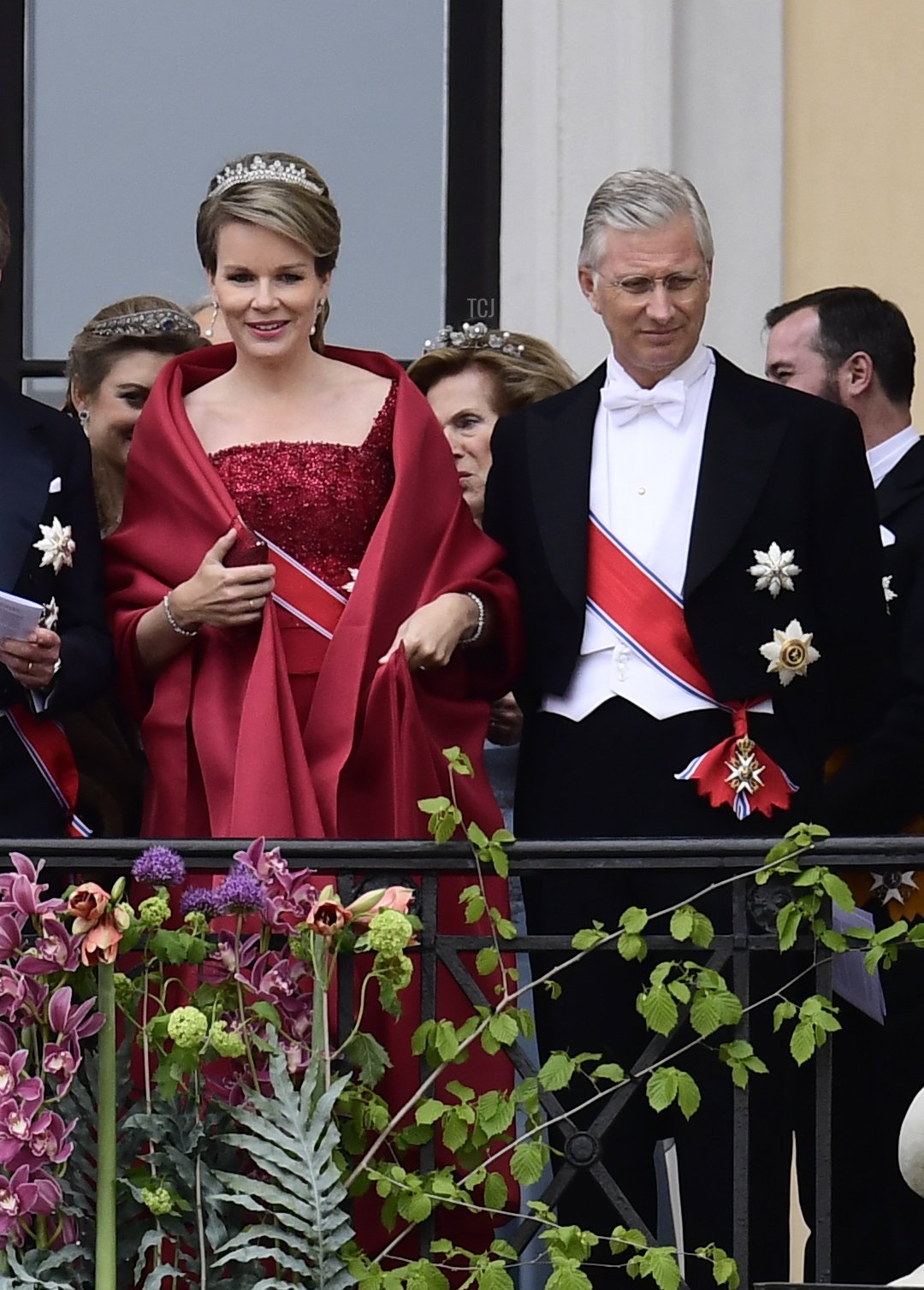 Queen Mathilde of Belgium and King Philippe of the Belgians greet well-wishers from the balcony of the Royal Palace in Oslo, Norway on May 9, 2017 (JON OLAV NESVOLD/AFP via Getty Images)