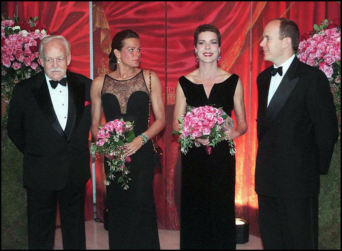 Prince Rainier III, Princess Stephanie, Princess Caroline, and Prince Albert attend the Rose Ball in Monaco on March 15, 1997 (ALAIN FULCONIS/AFP via Getty Images)