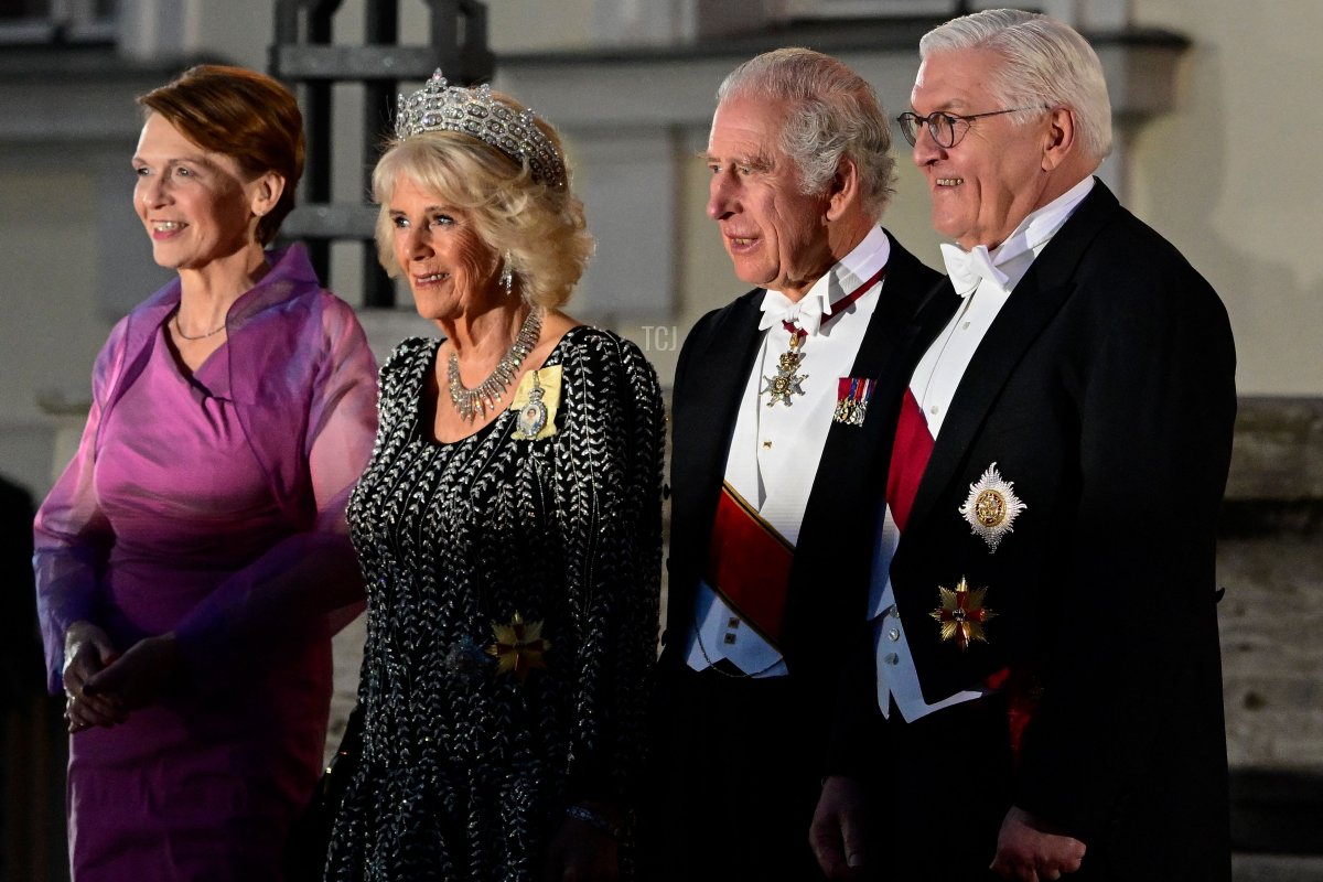 King Charles III and Queen Camilla are welcomed by German President Frank-Walter Steinmeier and his wife, Elke Buedenbender, as they arrive for a state banquet at the Schloss Bellevue in Berlin, on March 29, 2023 (JOHN MACDOUGALL/AFP via Getty Images)