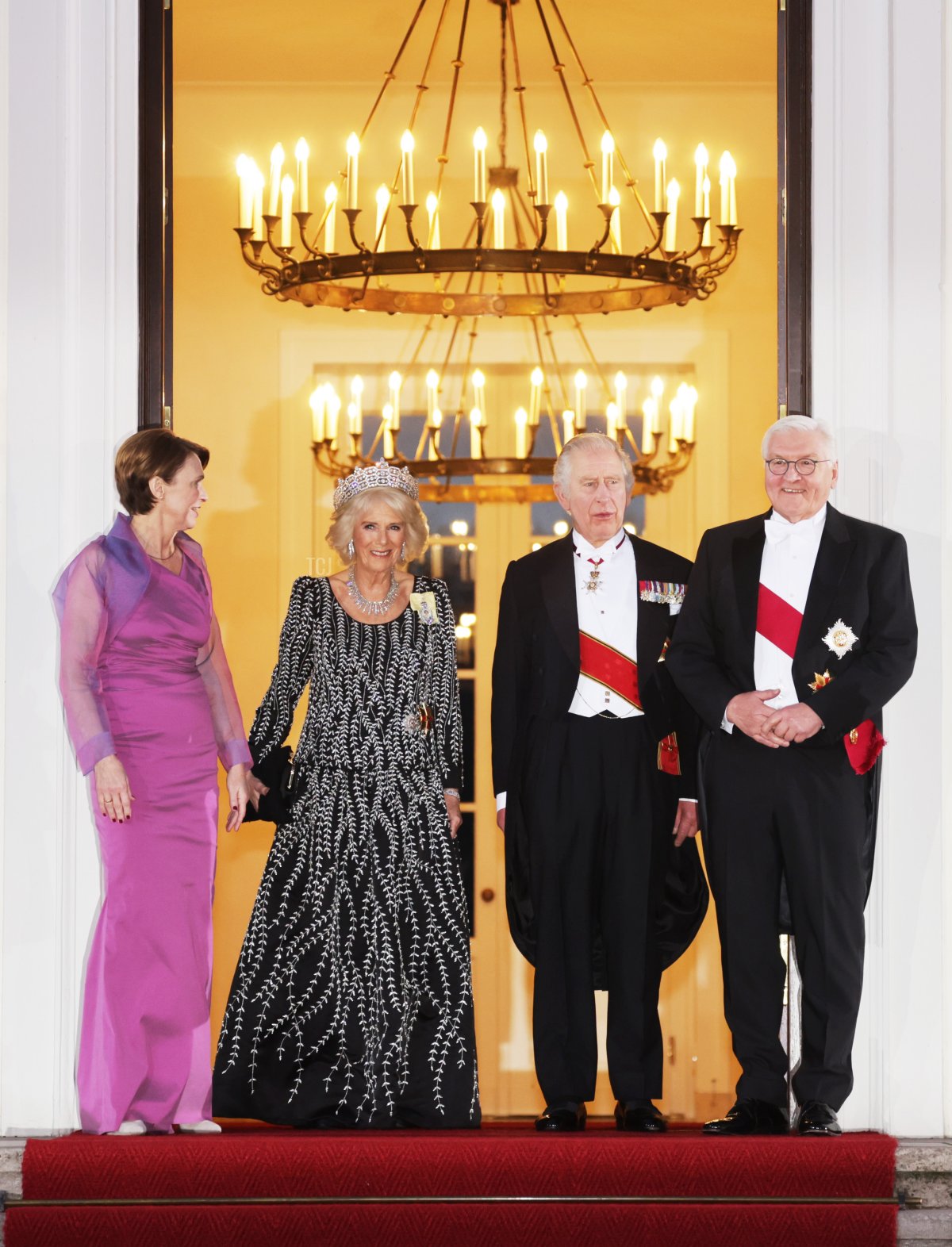 King Charles III and Queen Camilla are welcomed by German President Frank-Walter Steinmeier and his wife, Elke Buedenbender, as they arrive for a state banquet at the Schloss Bellevue in Berlin, on March 29, 2023 (Chris Jackson/Getty Images)