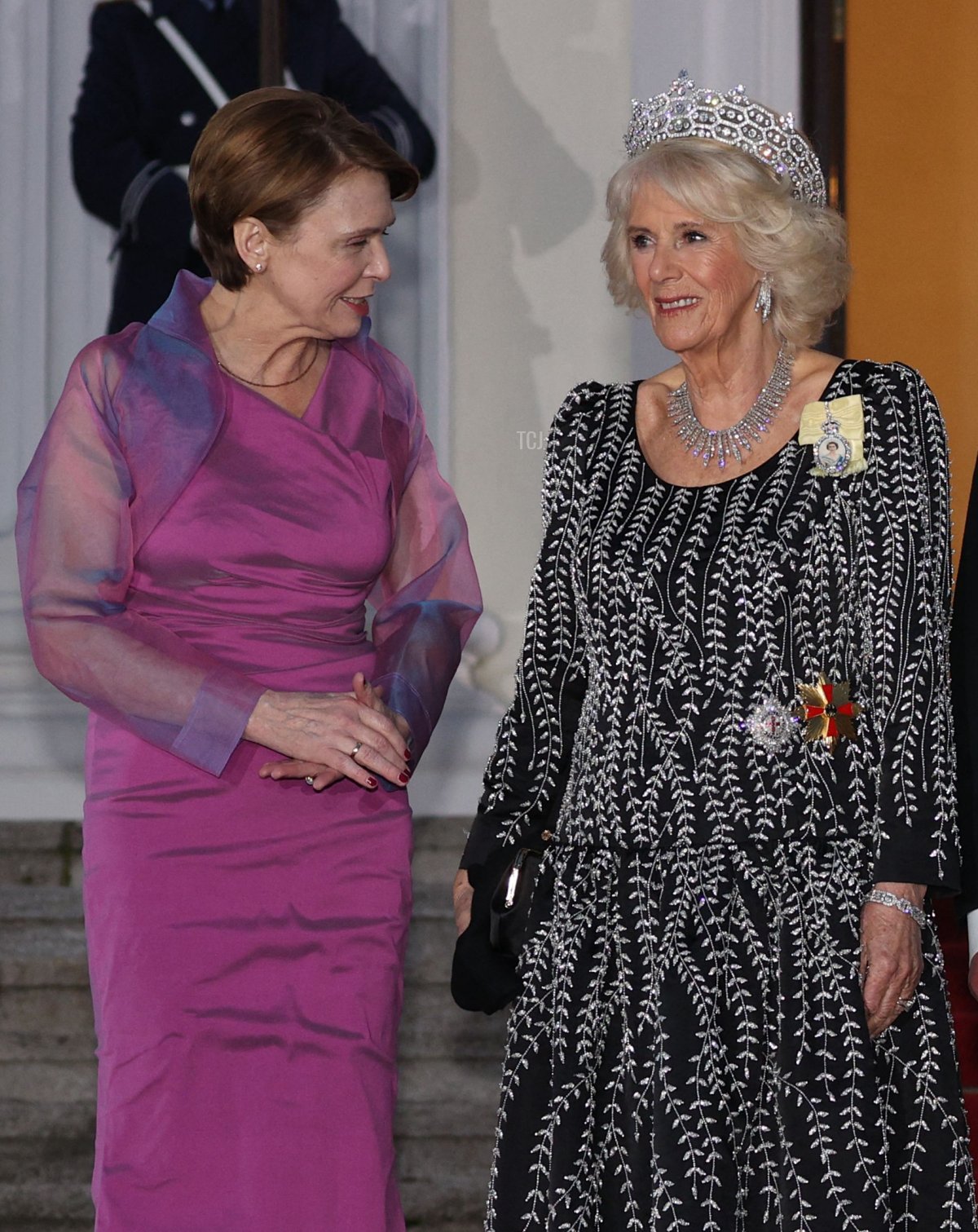 Queen Camilla and Elke Buedenbender arrive for a state banquet at the Schloss Bellevue in Berlin, on March 29, 2023 (ADRIAN DENNIS/AFP via Getty Images)