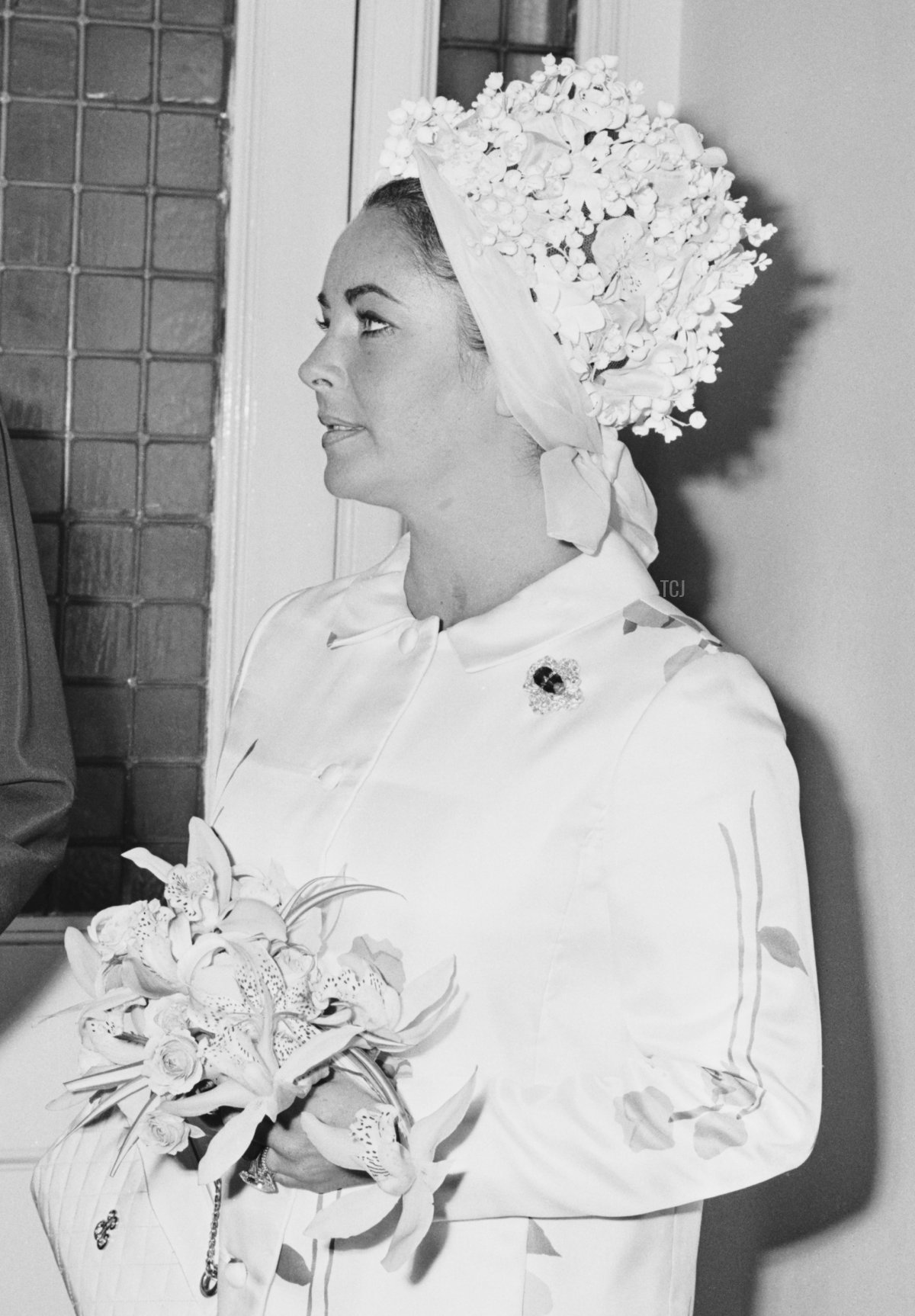 Elizabeth Taylor serves as a bridesmaid at the wedding of Robert Wilson and Gladys Mills, August 1969 (Reg Burkett/Daily Express/Hulton Archive/Getty Images)