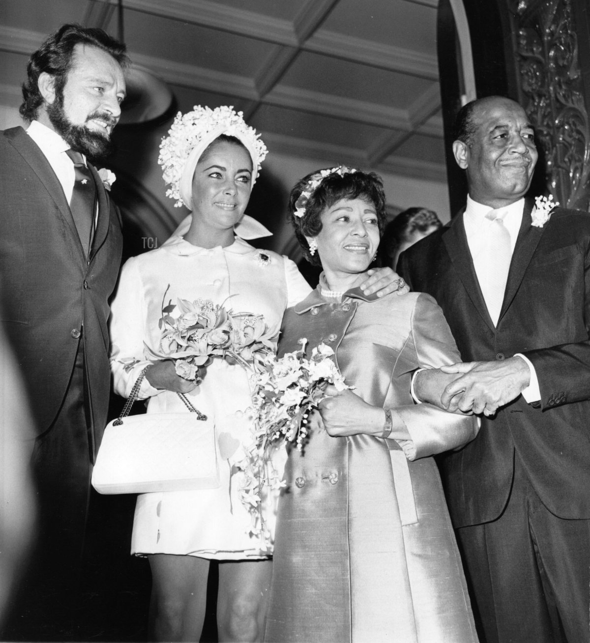 Richard Burton and his wife, actress Elizabeth Taylor, at the wedding of Burton's personal assistant, Robert Wilson, and Gladys Mills at Caxton Hall, London, August 1969 (Michael Webb/Keystone/Getty Images)