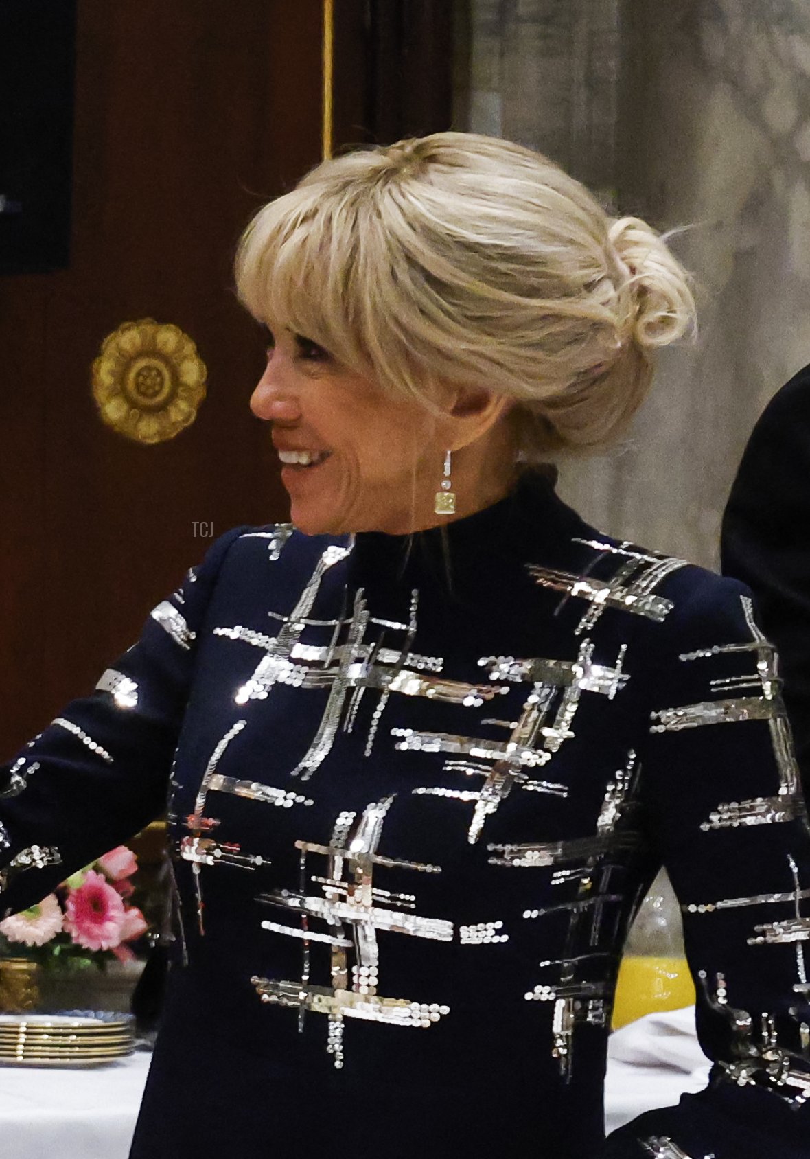 Brigitte Macron toasts during a state dinner at the Royal Palace in Amsterdam, part of a state visit to the Netherlands, on April 11, 2023 (LUDOVIC MARIN/POOL/AFP via Getty Images)