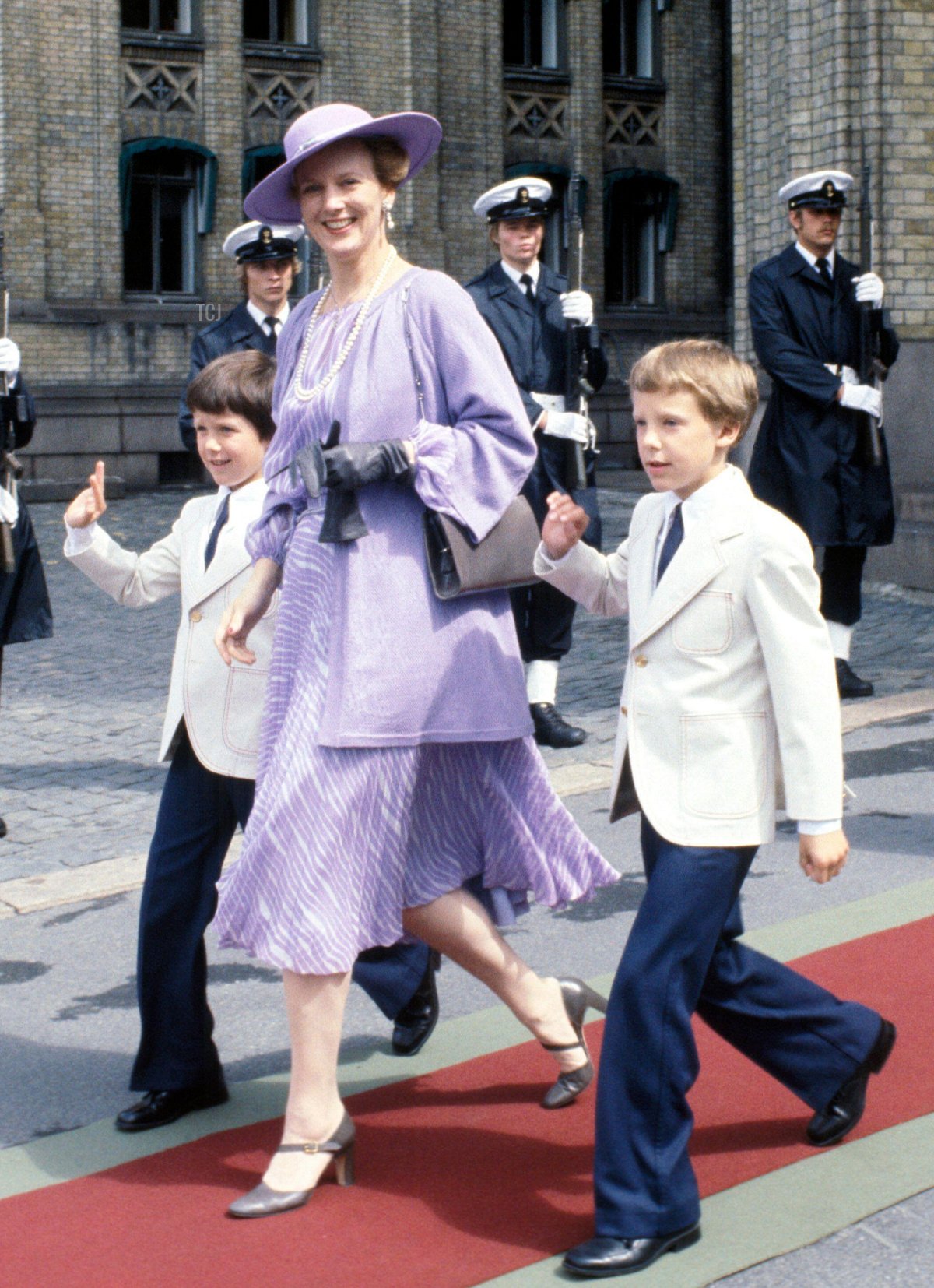 Queen Margrethe II of Denmark and her sons, Crown Prince Frederik and Prince Joachim, leave the Storting in Oslo following a reception celebrating King Olav V of Norway's 75th birthday, July 2, 1978 (Bjørn Sigurdsøn/NTB/Alamy)
