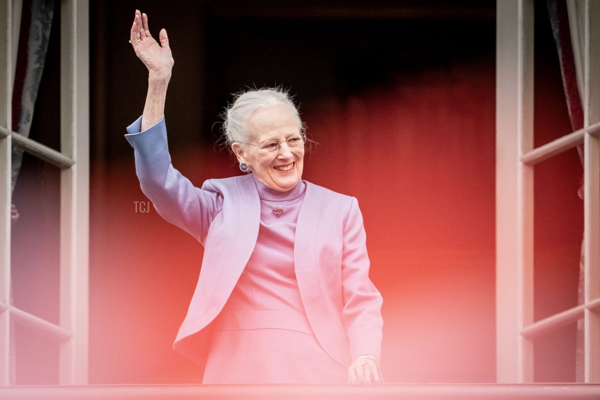 Queen Margrethe II of Denmark waves to the crowd on her 83rd birthday from the balcony of Amalienborg Castle in Copenhagen on April 16, 2023 (MADS CLAUS RASMUSSEN/Ritzau Scanpix/AFP via Getty Images)