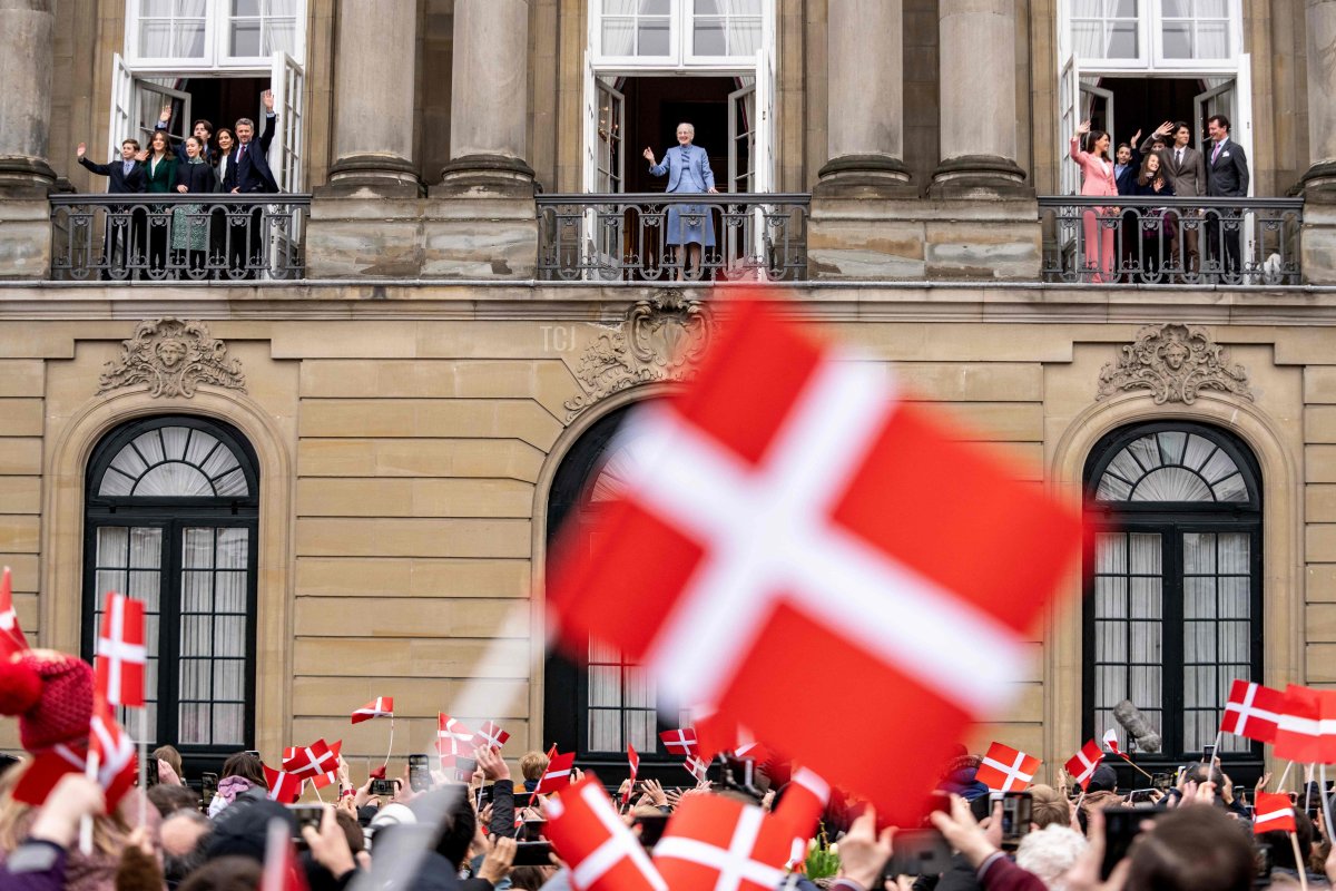 Queen Margrethe II of Denmark and her family members wave to the crowd on the Queen's 83rd birthday from the balconies of Amalienborg Castle in Copenhagen on April 16, 2023 (MADS CLAUS RASMUSSEN/Ritzau Scanpix/AFP via Getty Images)