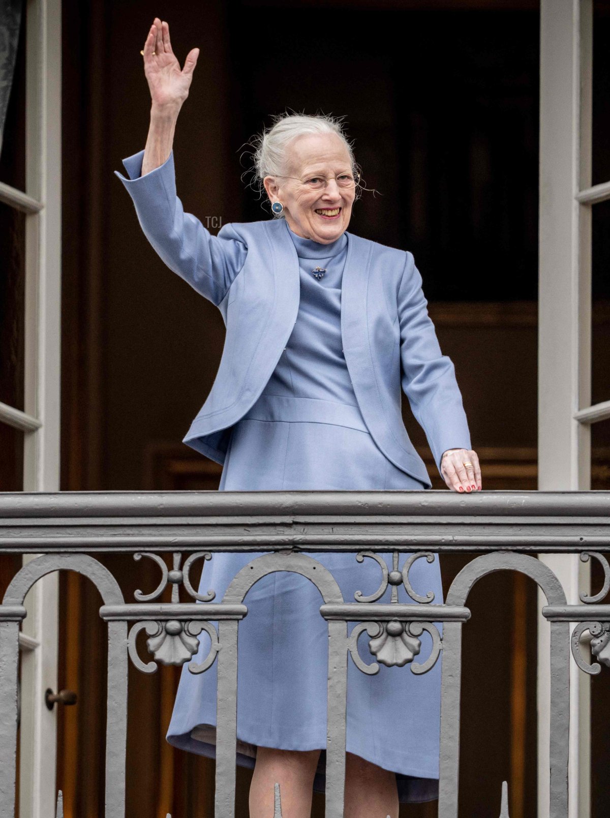 Queen Margrethe II of Denmark waves to the crowd on her 83rd birthday from the balcony of Amalienborg Castle in Copenhagen on April 16, 2023 (MADS CLAUS RASMUSSEN/Ritzau Scanpix/AFP via Getty Images)