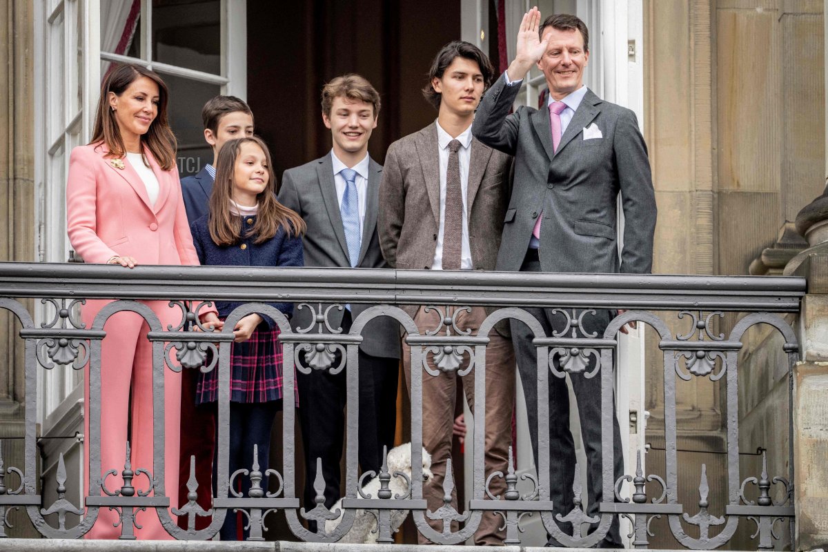 Princess Marie, Count Henrik, Countess Athena, Count Felix, Count Nikolai, and Prince Joachim are pictured on the balcony of Amalienborg Castle in Copenhagen on the Queen's 83rd birthday, April 16, 2023 (MADS CLAUS RASMUSSEN/Ritzau Scanpix/AFP via Getty Images)