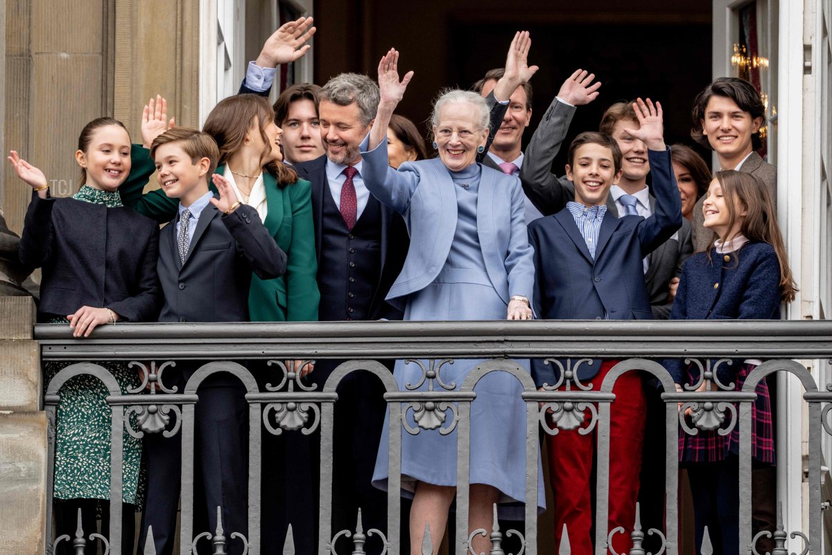 Queen Margrethe II of Denmark and her family members wave to the crowd on the Queen's 83rd birthday from the balconies of Amalienborg Castle in Copenhagen on April 16, 2023 (MADS CLAUS RASMUSSEN/Ritzau Scanpix/AFP via Getty Images)