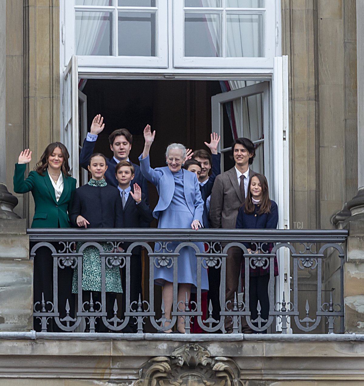 Queen Margrethe II of Denmark and her grandchildren wave to the crowd on the Queen's 83rd birthday from the balconies of Amalienborg Castle in Copenhagen on April 16, 2023 (Ole Jensen/Getty Images)