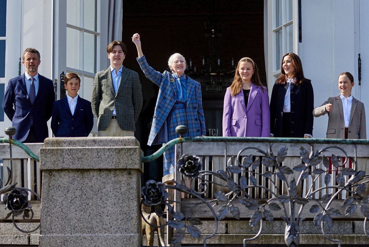 Crown Prince Frederik, Prince Vincent, Prince Christian, Queen Margrethe II, Princess Isabella, Crown Princess Mary, and Princess Josephine of Denmark wave from the balcony of Marselisborg Castle in Aarhus, on April 16, 2022, on the occasion of Queen Margrethe's 82nd birthday (MIKKEL BERG PEDERSEN/Ritzau Scanpix/AFP via Getty Images)
