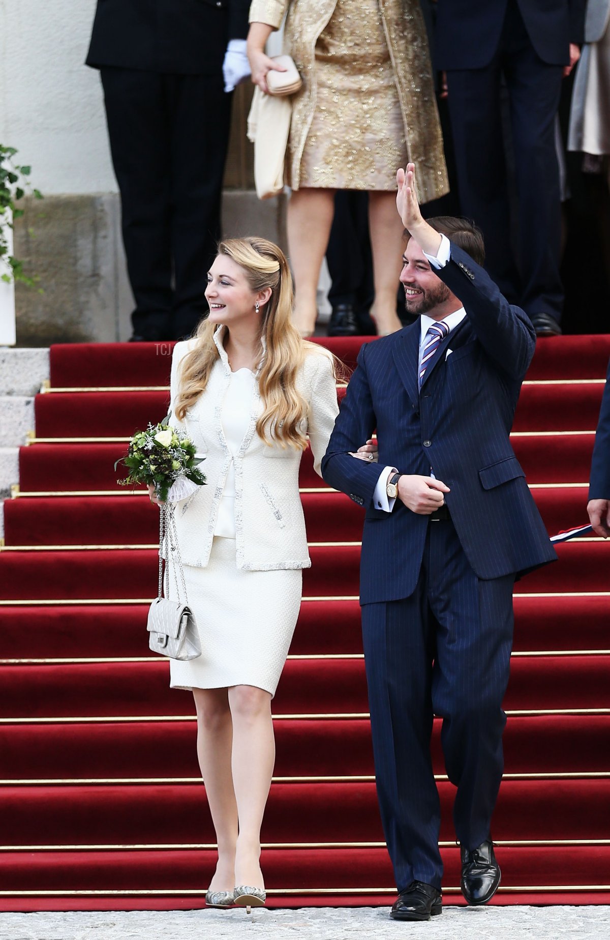 Hereditary Grand Duke Guillaume of Luxembourg and Countess Stephanie de Lannoy wave to the crowd as they leave the Hotel de Ville, where the couple were married in a civil ceremony on October 19, 2012 in Luxembourg (Andreas Rentz/Getty Images)