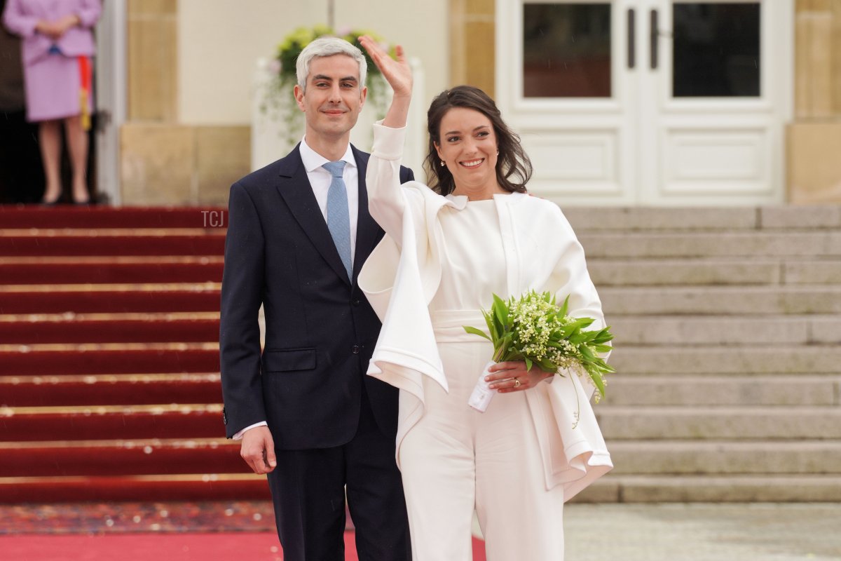 Princess Alexandra of Luxembourg and Nicolas Bagory greet the crowd as they leave the Hotel de Ville after their civil wedding ceremony on April 22, 2023 in Luxembourg (Sylvain Lefevre/Getty Images)