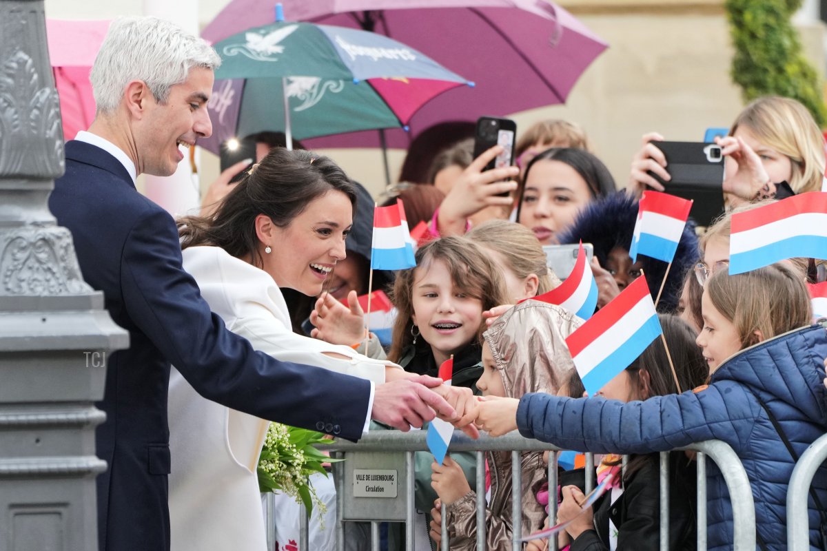 Princess Alexandra of Luxembourg and Nicolas Bagory greet the crowd as they leave the Hotel de Ville after their civil wedding ceremony on April 22, 2023 in Luxembourg (Sylvain Lefevre/Getty Images)