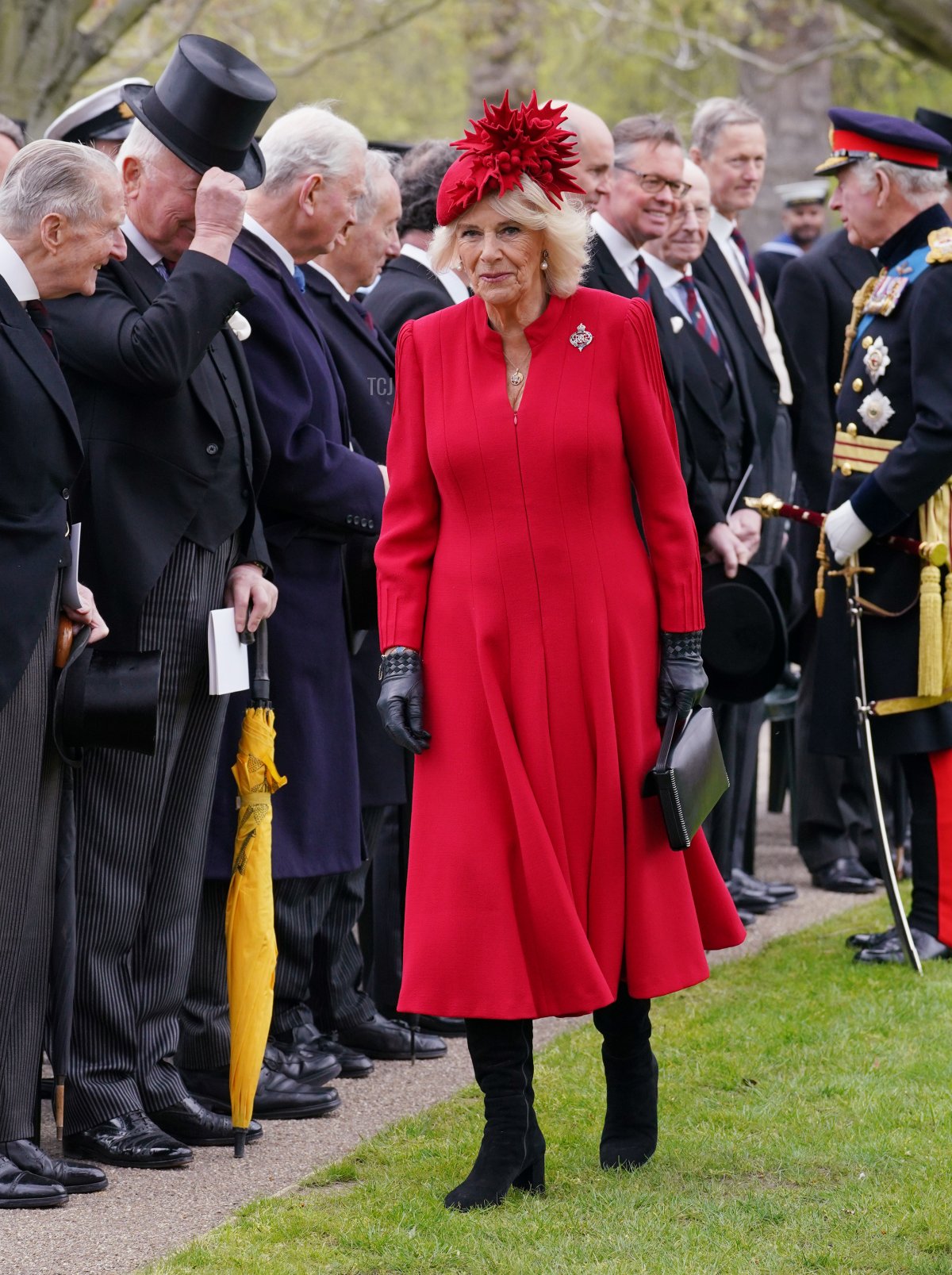Queen Camilla, Colonel of Grenadier Guards meets guests after a ceremony to present the new standards and colours to the Royal Navy, the Life Guards of the Household Cavalry Mounted Regiment, The King's Company of the Grenadier Guards and The King's Colour Squadron of the Royal Air Force at Buckingham Palace, in London, on April 27, 2023 (YUI MOK/POOL/AFP via Getty Images)