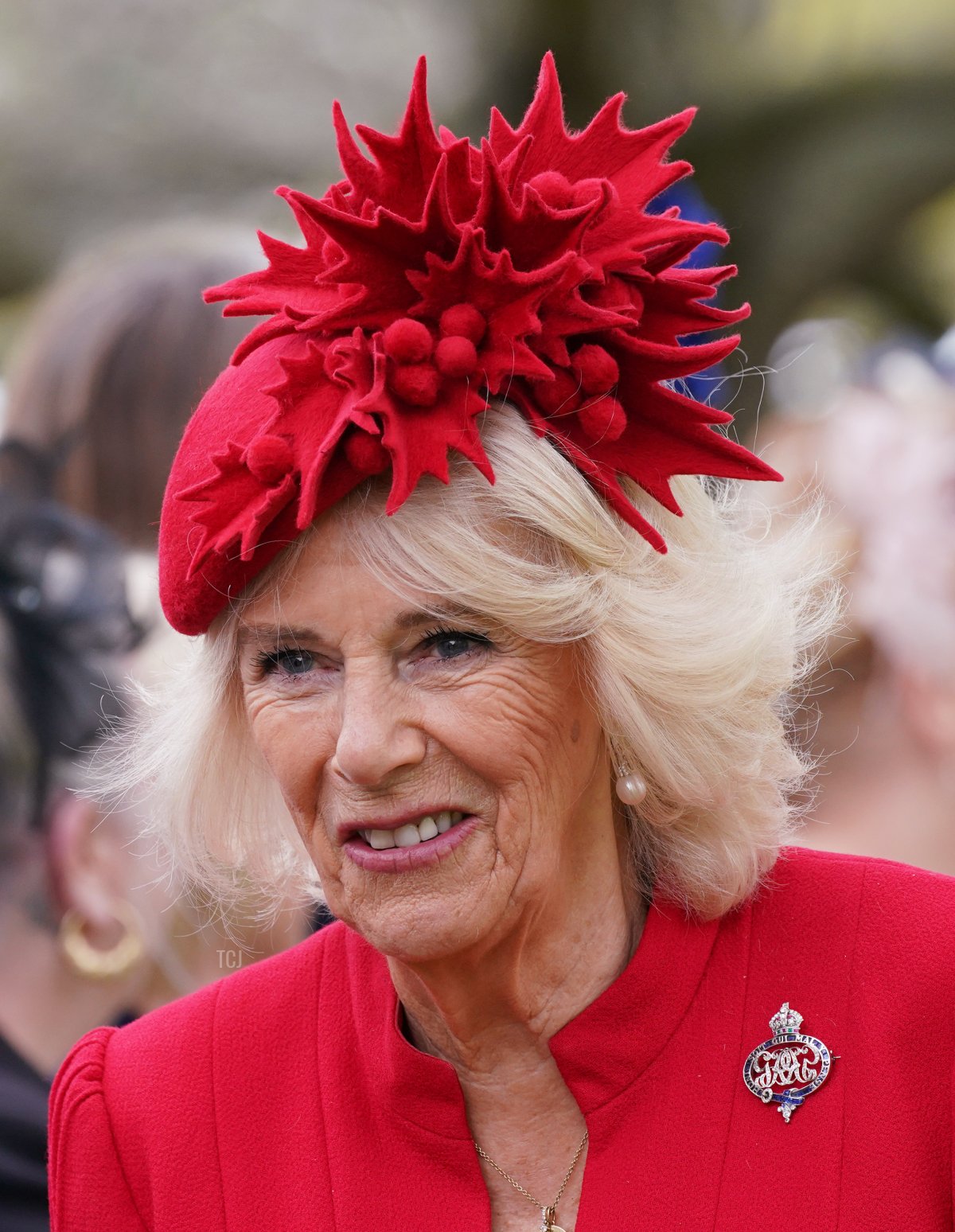 Queen Camilla, Colonel of Grenadier Guards meets guests after a ceremony to present the new standards and colours to the Royal Navy, the Life Guards of the Household Cavalry Mounted Regiment, The King's Company of the Grenadier Guards and The King's Colour Squadron of the Royal Air Force at Buckingham Palace, in London, on April 27, 2023 (YUI MOK/POOL/AFP via Getty Images)