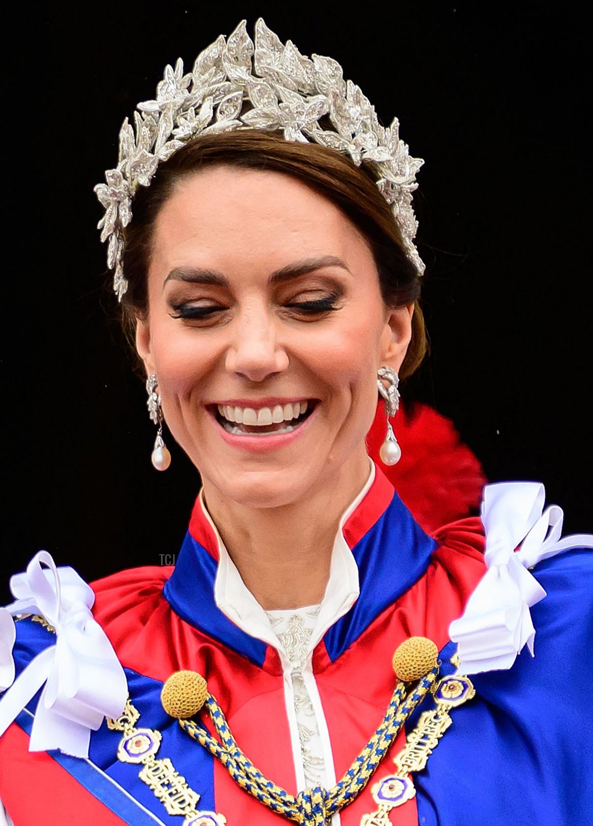 The Princess of Wales laughs on the balcony of Buckingham Palace after the coronation ceremony, May 6, 2023 (LEON NEAL/POOL/AFP via Getty Images)