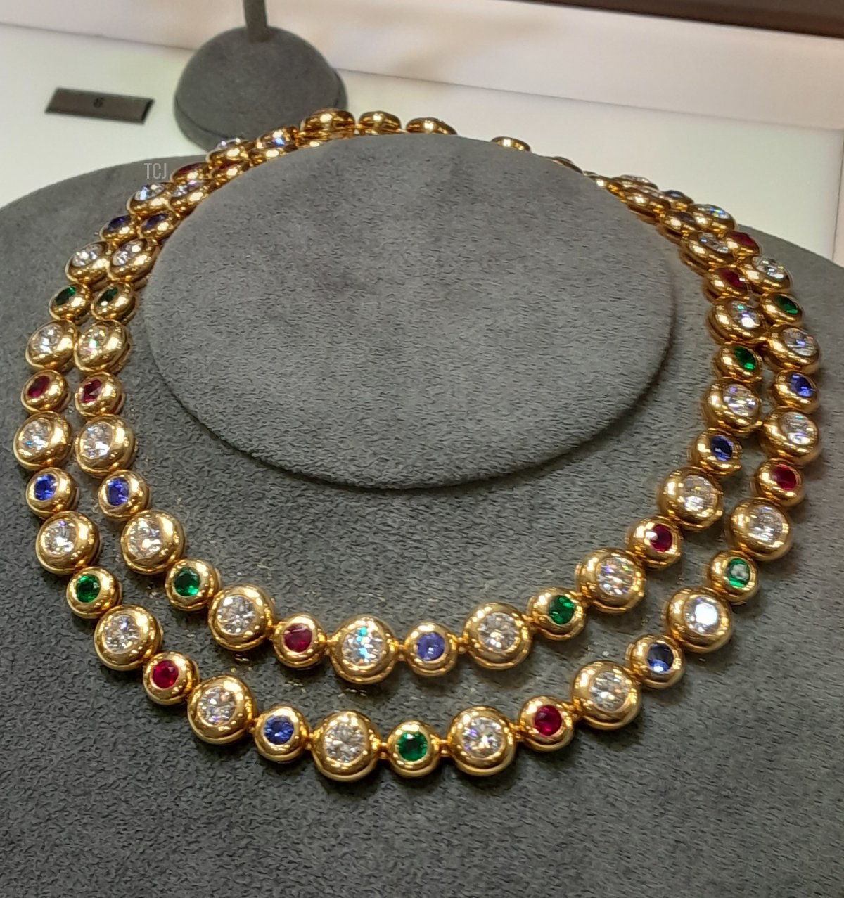 The necklace from a demi-parure of Köchert jewels, made of diamonds, emeralds, sapphires, and rubies set in yellow gold, from the Heidi Horten collection sold at Christie's (Photo © Thomas. Do not reproduce.)