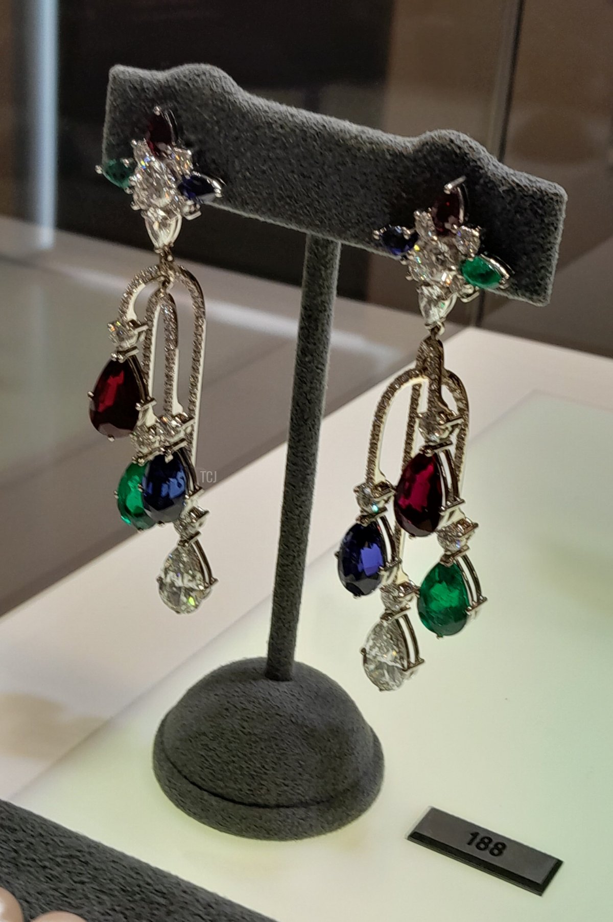 A pair of modern Köchert chandelier earrings, made of rubies, sapphires, emeralds, and diamonds set in white gold, from the Heidi Horten collection sold at Christie's (Photo © Thomas. Do not reproduce.)