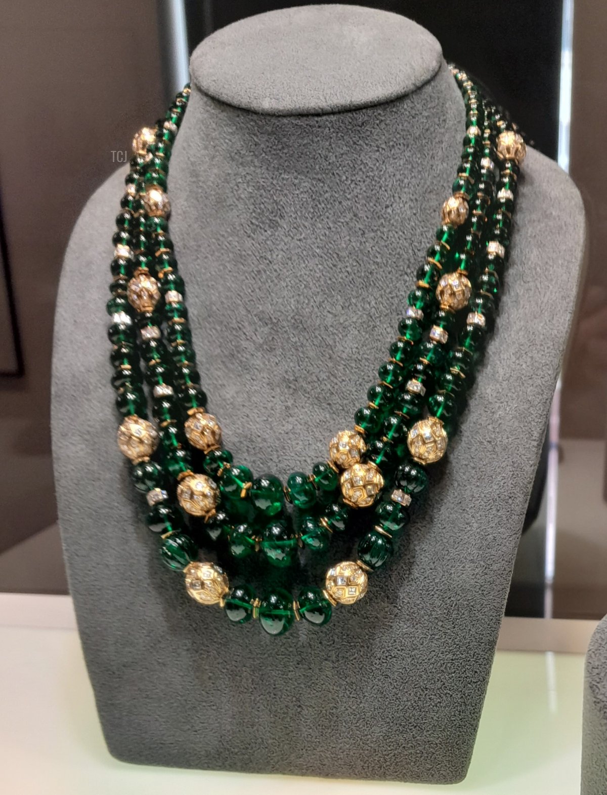 A Bulgari necklace of cabochon emeralds and white diamonds set in yellow gold, from the Heidi Horten collection sold at Christie's (Photo © Thomas. Do not reproduce.)