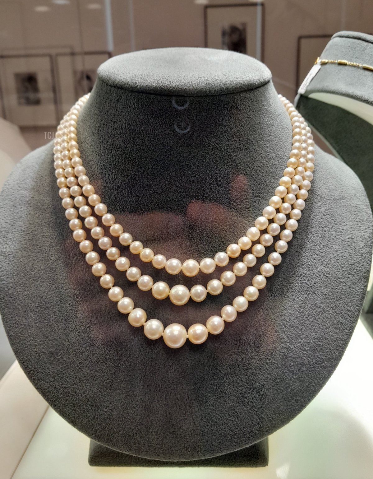 A three-row necklace of natural pearls with a diamond clasp, from the Heidi Horten collection sold at Christie's (Photo © Thomas. Do not reproduce.)