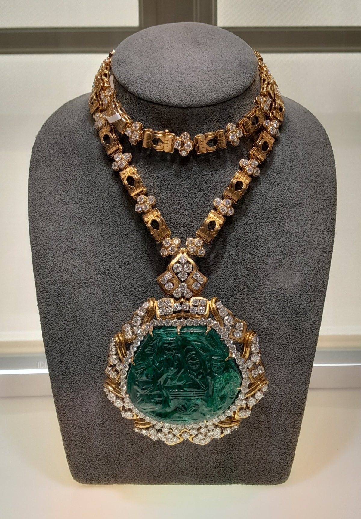 A gold, diamond, and carved emerald necklace by Harry Winston, from the collection of Heidi Horten, recently sold by Christie's in Geneva (Photo © Thomas. Do not reproduce.)