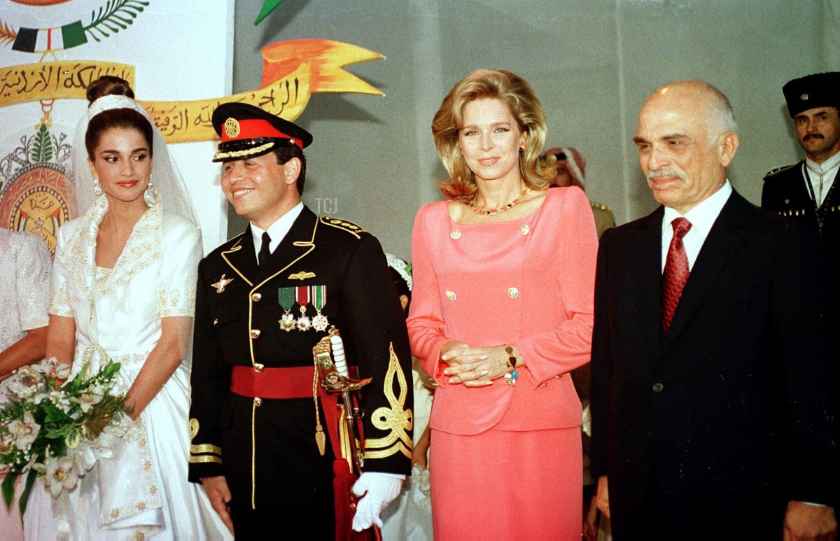 Prince Abdullah and Rania Al-Yassin are pictured with King Hussein and Queen Noor of Jordan on the day of their wedding at the Royal Palace in Amman on June 10, 1993 (RABIH MOGHRABI/AFP via Getty Images)