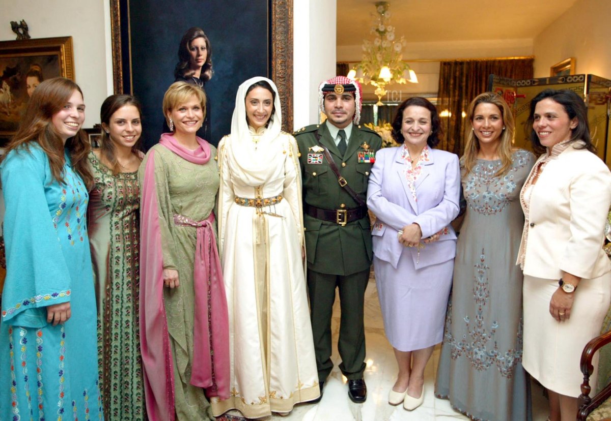 Prince Ali of Jordan and his new wife, former CNN reporter Rym Brahimi, are pictured on their wedding day in Amman with his sisters, September 7, 2004 (YUSSEF ALLAN/JORDANIAN ROYAL PALACE/AFP via Getty Images)