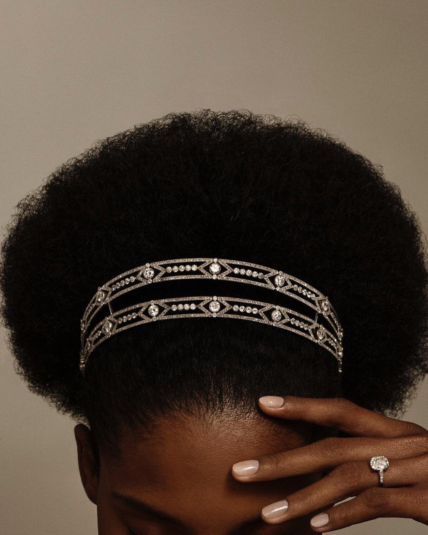 A model wears an early 20th century diamond bandeau from Boucheron (Christie's)