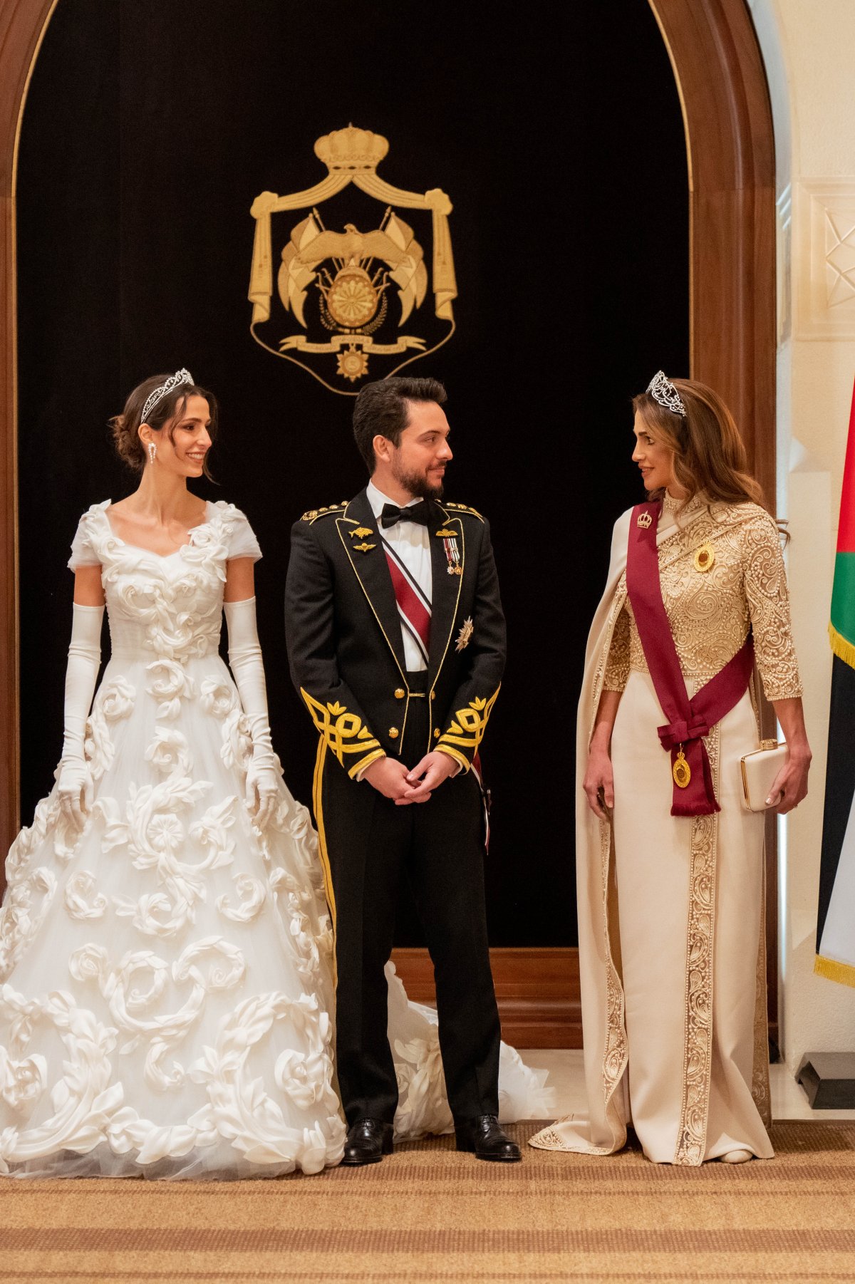 Crown Prince Hussein and Princess Rajwa of Jordan, with Queen Rania, attend a banquet celebrating their wedding in Amman, June 1, 2023 (Royal Hashemite Court)