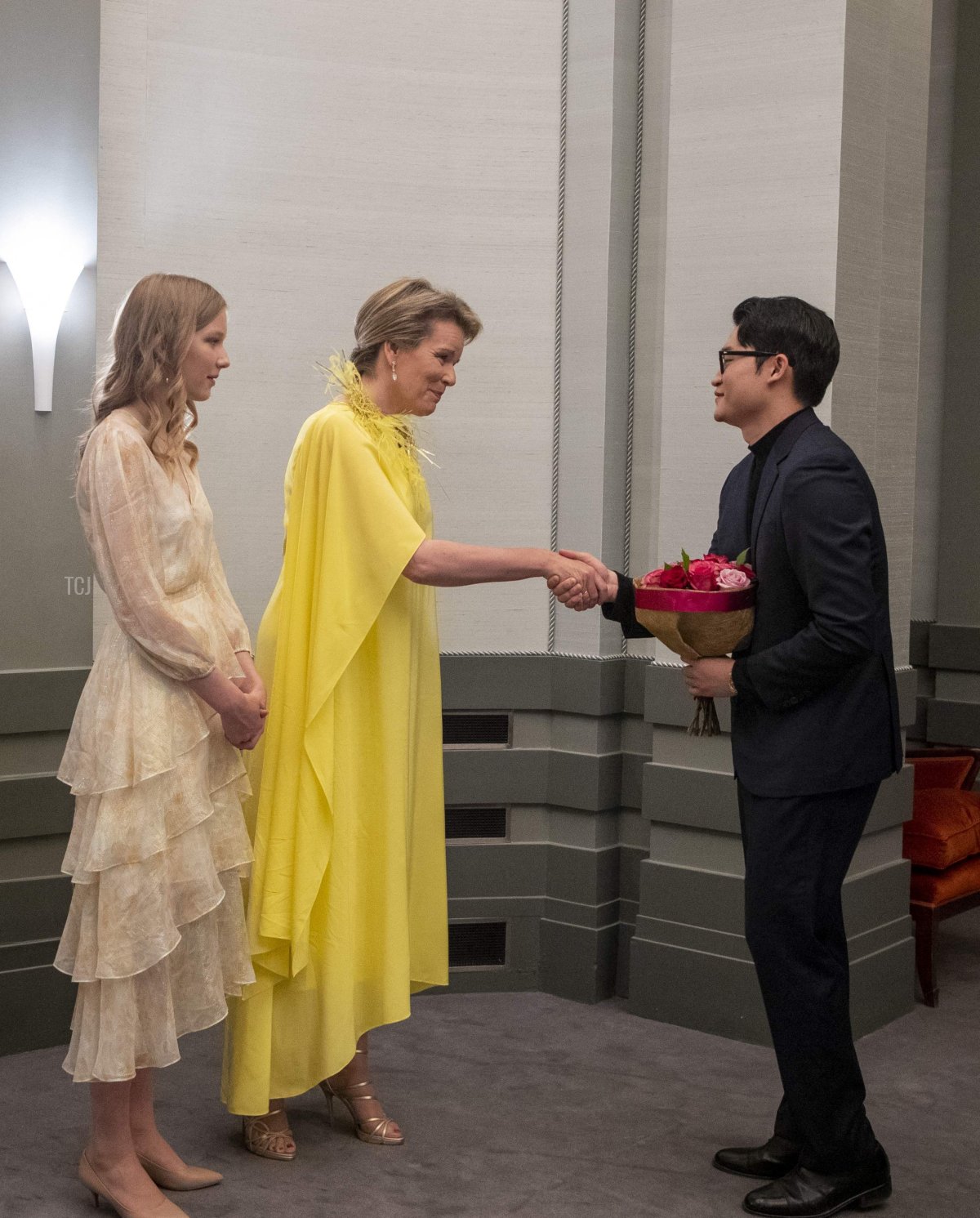 Princess Eleonore of Belgium and Queen Mathilde of the Belgians are pictured with Taehan Kim during the finals of the Queen Elisabeth Voice Competition at the Flagey Concert Hall in Brussels, June 3, 2023 (NICOLAS MAETERLINCK/BELGA MAG/AFP via Getty Images)