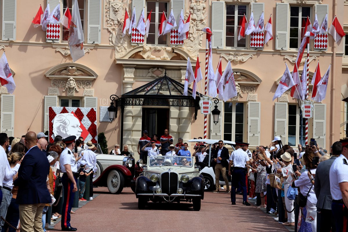 Members of the Grimaldi family take part in a parade of vintage cars during celebrations to mark the centenary of the birth of the late Prince Rainier III in Monaco on May 31, 2023 (VALERY HACHE/POOL/AFP via Getty Images)