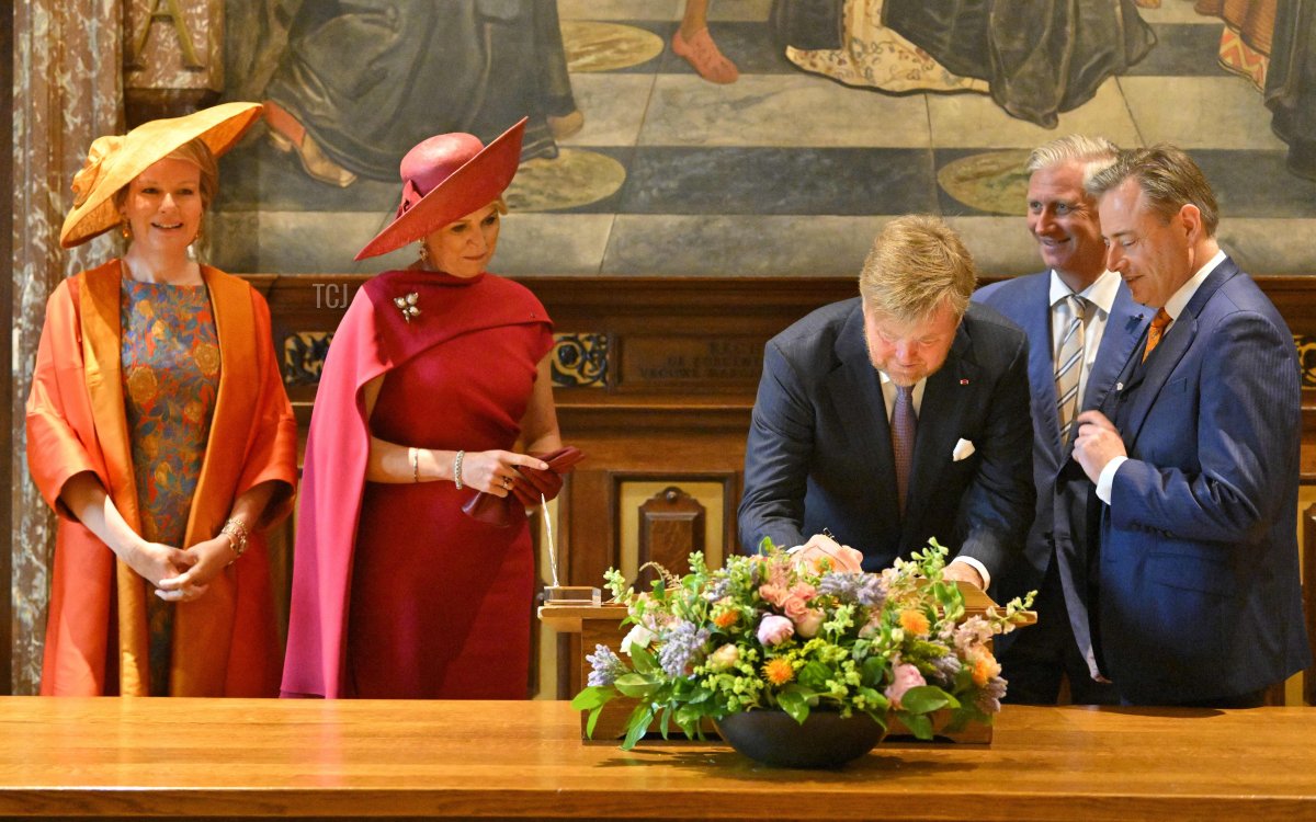 The Queen of the Belgians, the Queen of the Netherlands, the King of the Netherlands, the King of the Belgians, and Mayor Bart De Wever are pictured during a visit to Antwerp City Hall on the third and final day of the official state visit of the Dutch royal couple to Belgium, June 22, 2023 (PHILIP REYNAERS/BELGA MAG/AFP via Getty Images)