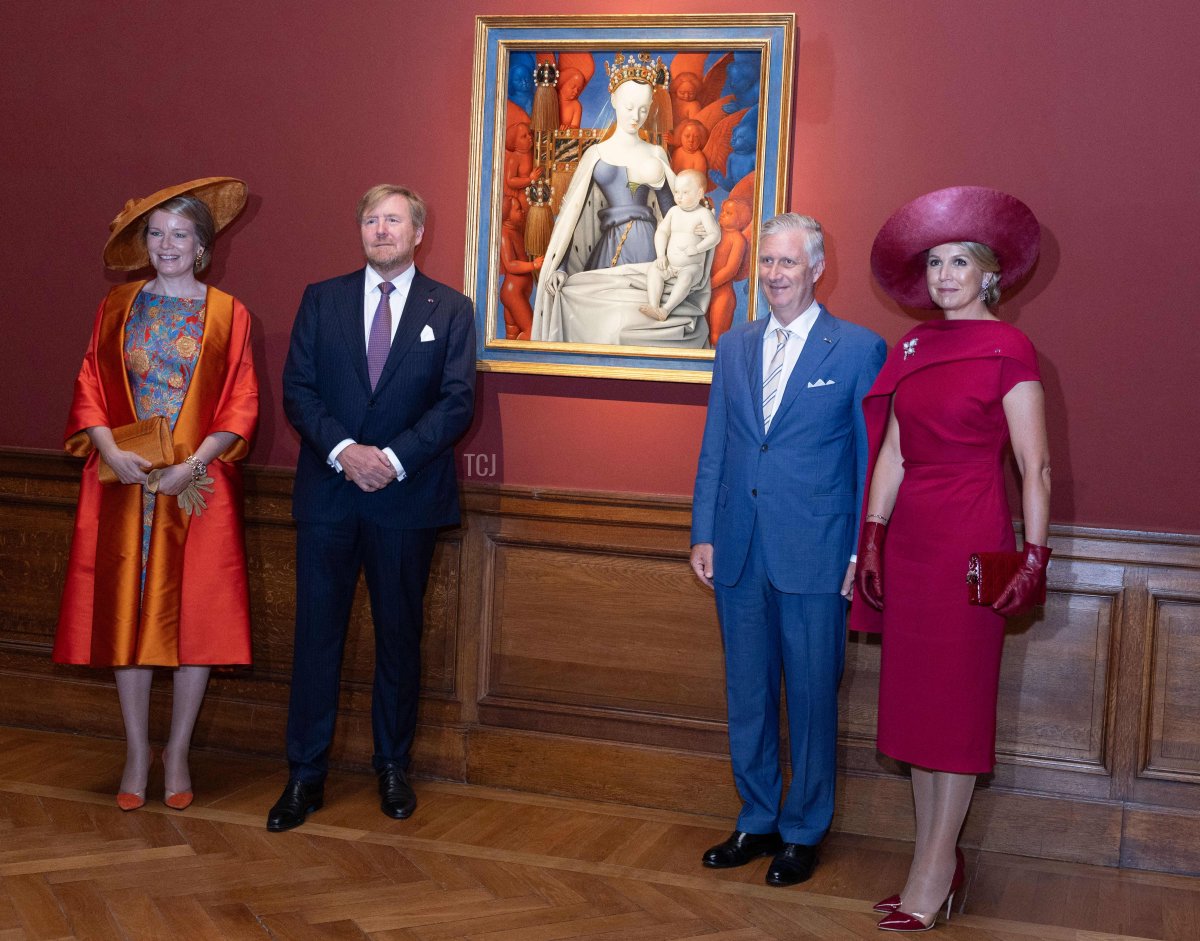 The Queen of the Belgians, the King of the Netherlands, the King of the Belgians, and the Queen of the Netherlands pose with Jean Fouquet's Madonna and Child at the the Royal Museum of Fine Arts in Antwerp on the third and final day of the official state visit of the Dutch royal couple to Belgium, June 22, 2023 (BENOIT DOPPAGNE/BELGA MAG/AFP via Getty Images)