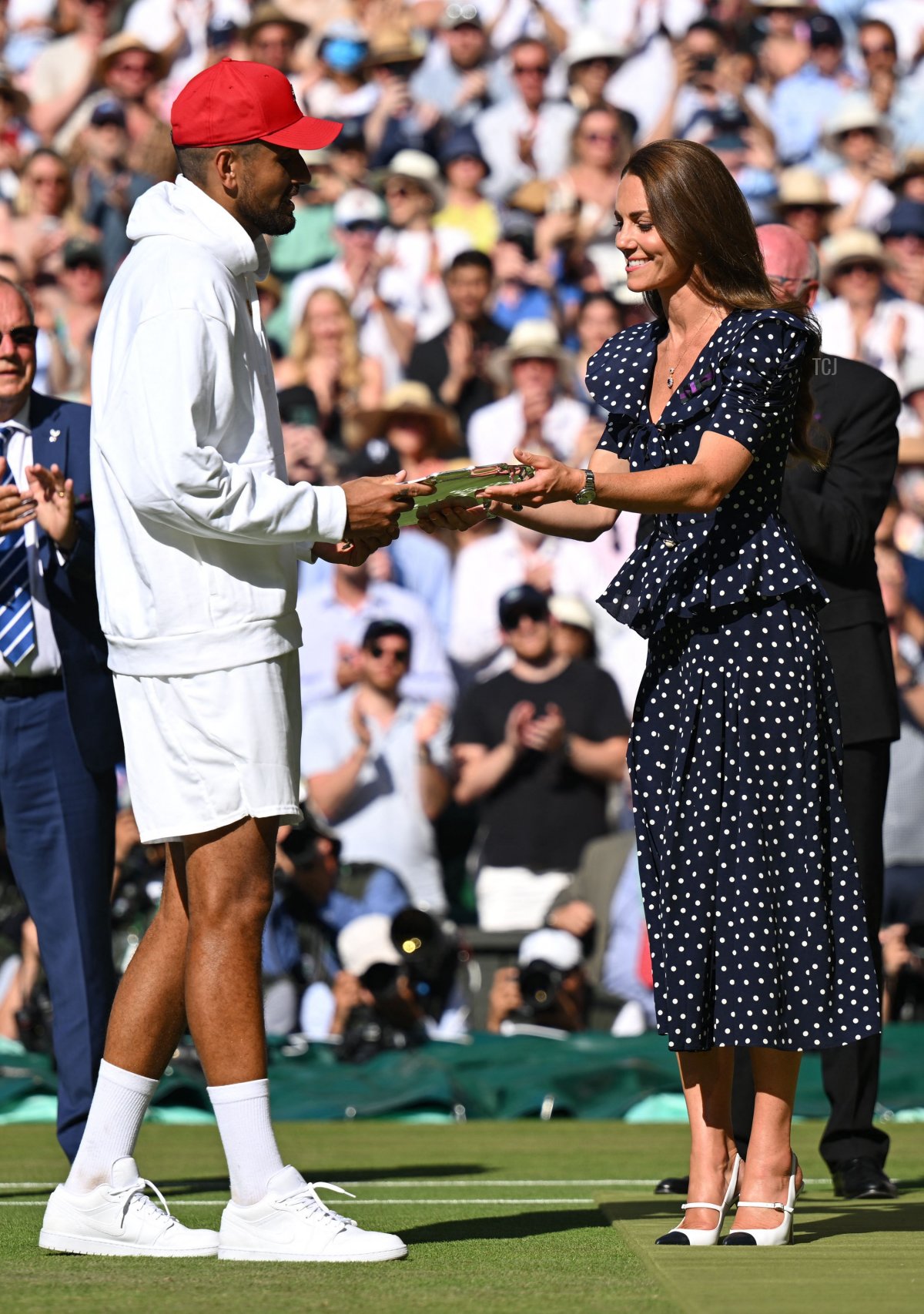 Nick Kyrgios receives the runner-up's trophy from the Duchess of Cambridge after the men's singles final tennis match of the 2022 Wimbledon Championships at the All England Tennis Club in Wimbledon on July 10, 2022 (SEBASTIEN BOZON/AFP via Getty Images)